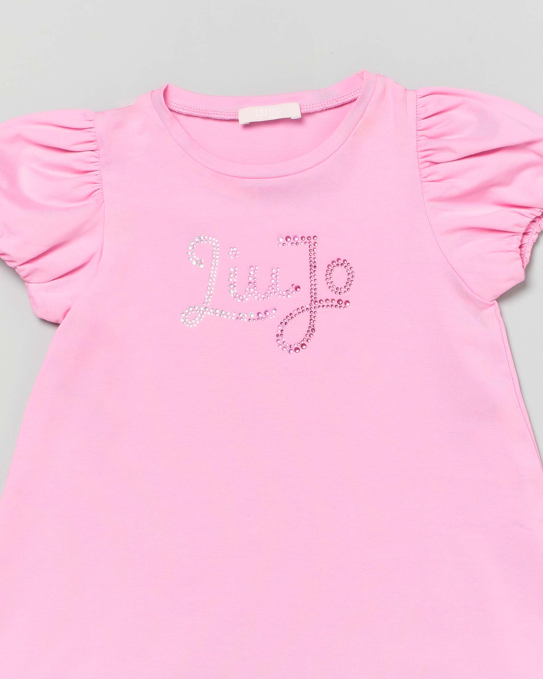 Abito rosa in cotone stretch a campana con strass