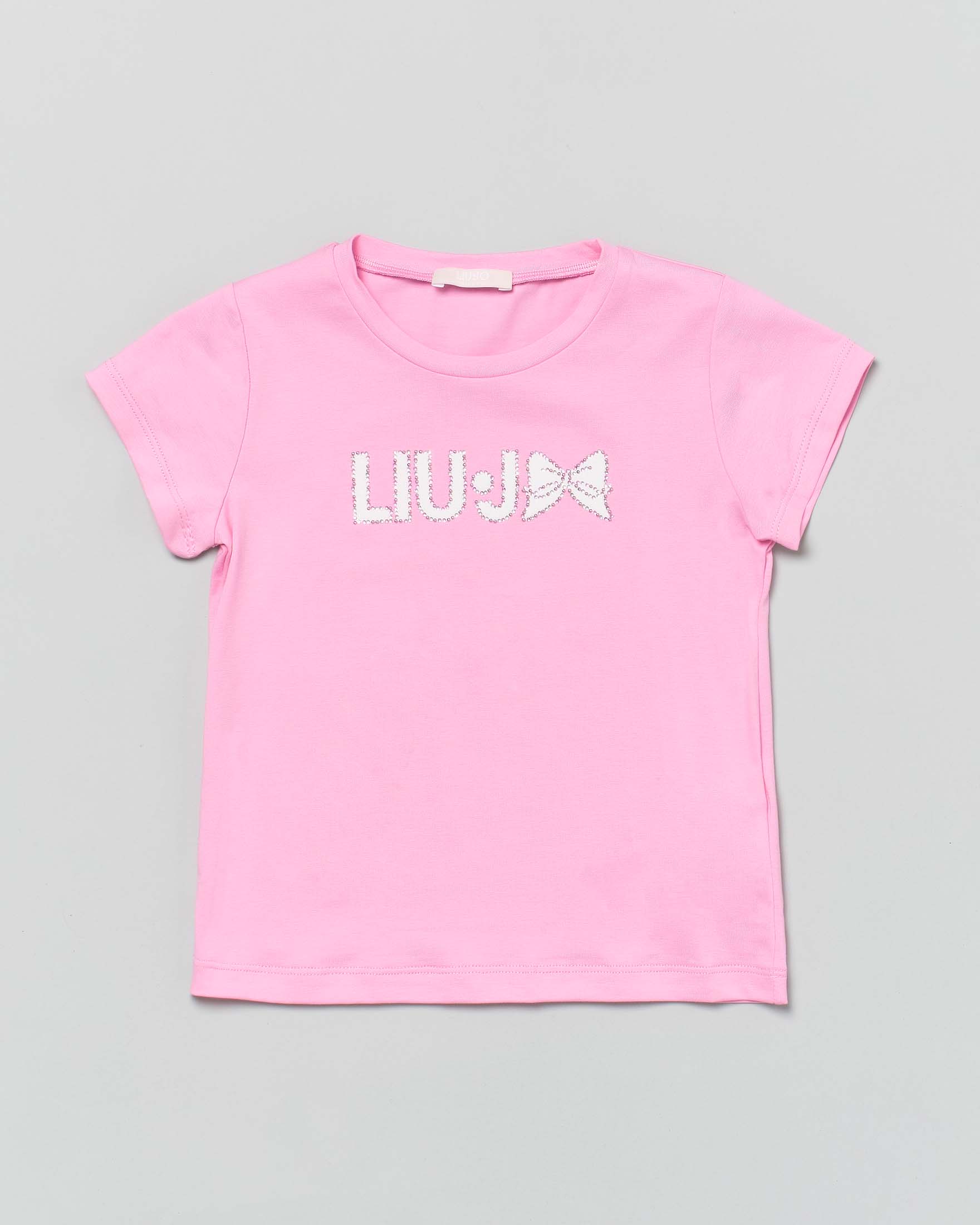T-shirt rosa mezza manica con logo e fiocco in strass