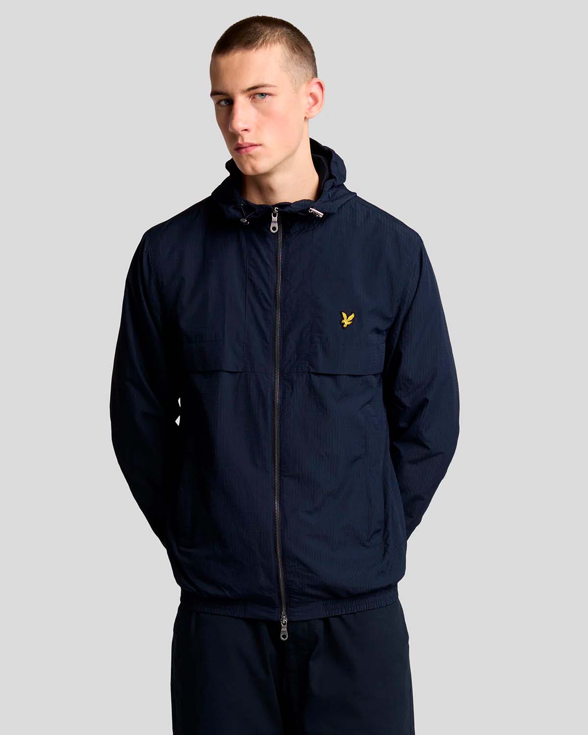 Giubbino blu in nylon ripstop relaxed fit con cappuccio