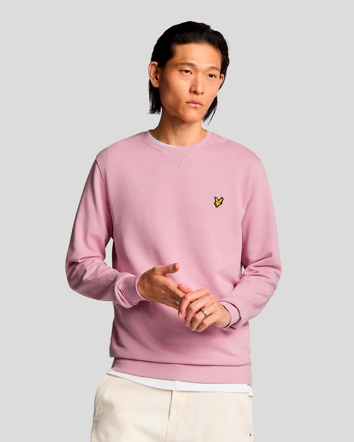 Felpa rosa girocollo in cotone con logo aquila gialla sul petto