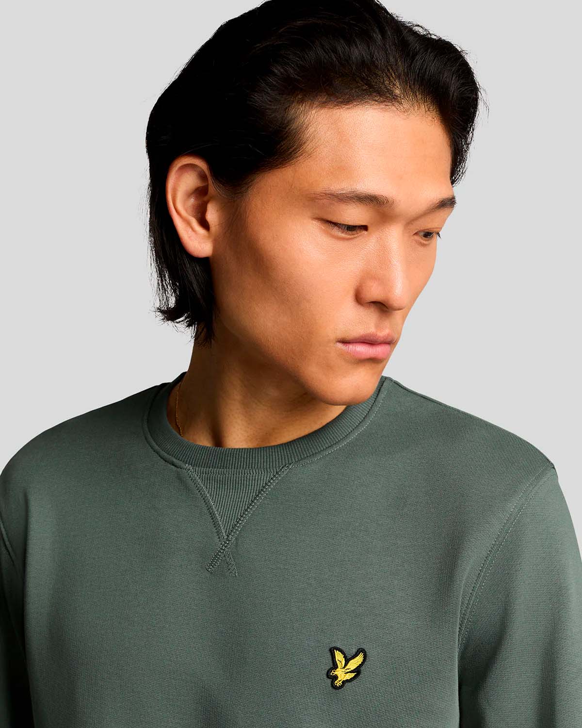 Felpa verde militare girocollo in cotone con logo aquila gialla sul petto