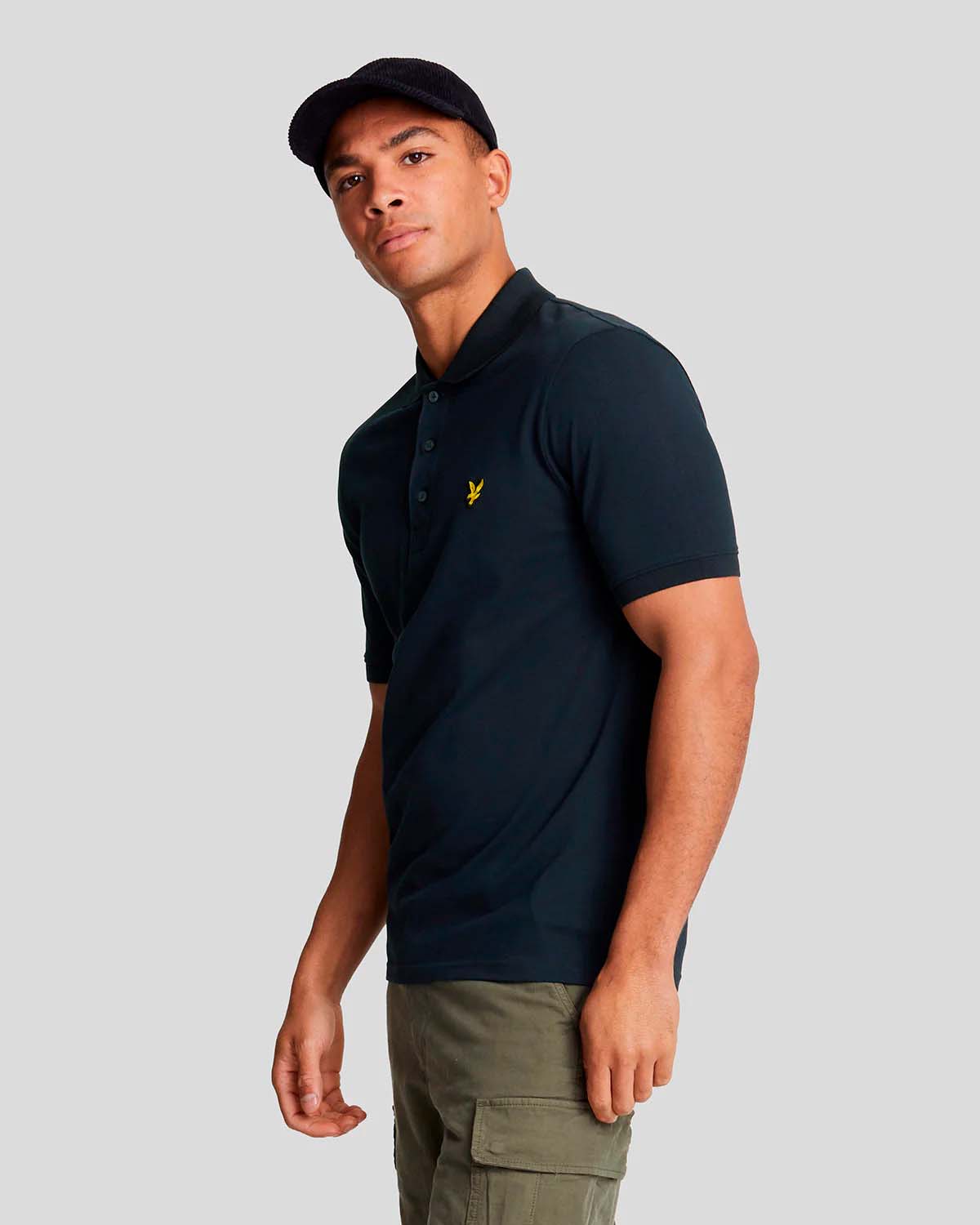 Polo Lyle & Scott blu mezza manica in piqué di cotone stretch con logo aquila gialla ricamato sul petto