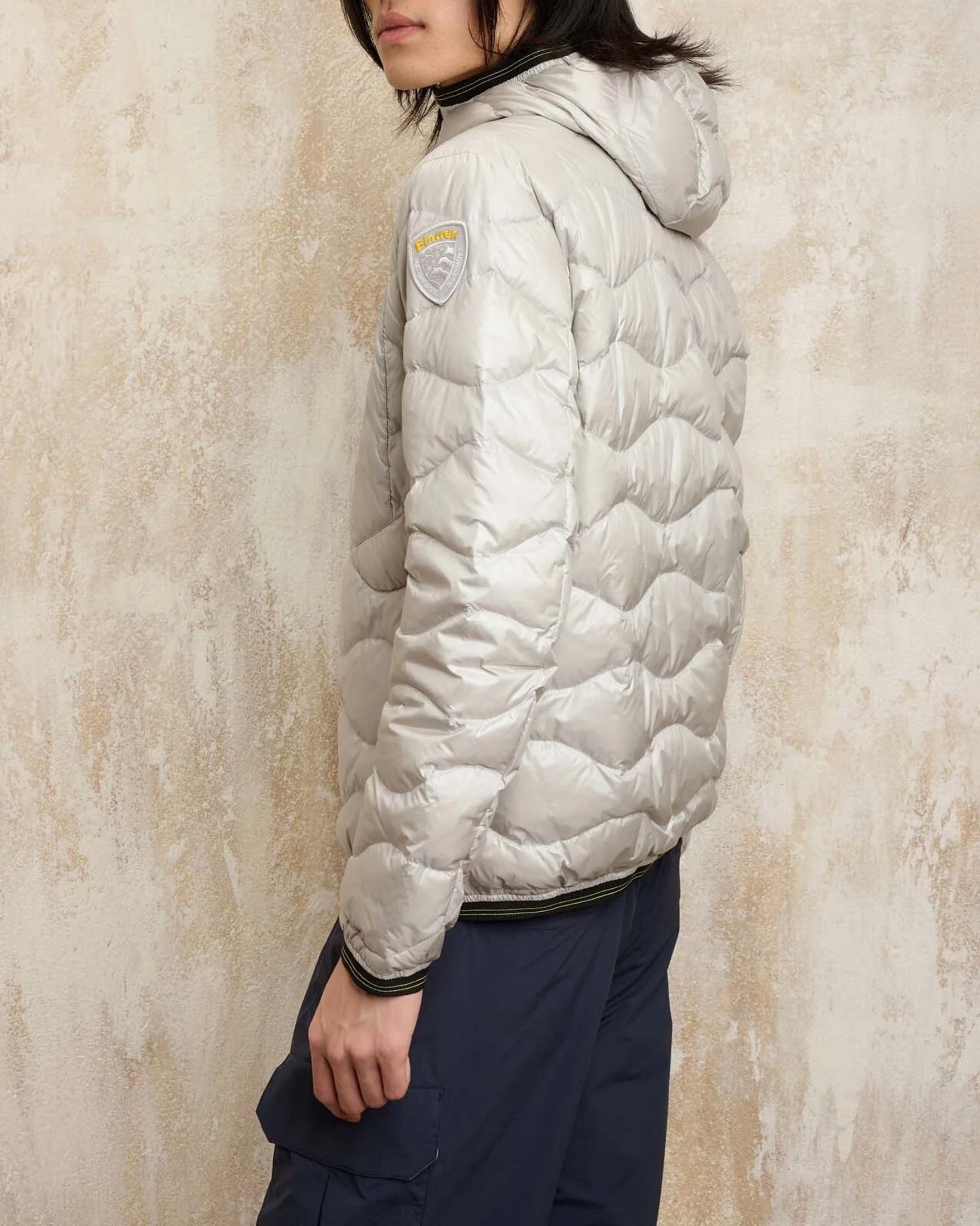 Piumino Wave grigio chiaro 100 grammi con cappuccio e trapuntatura