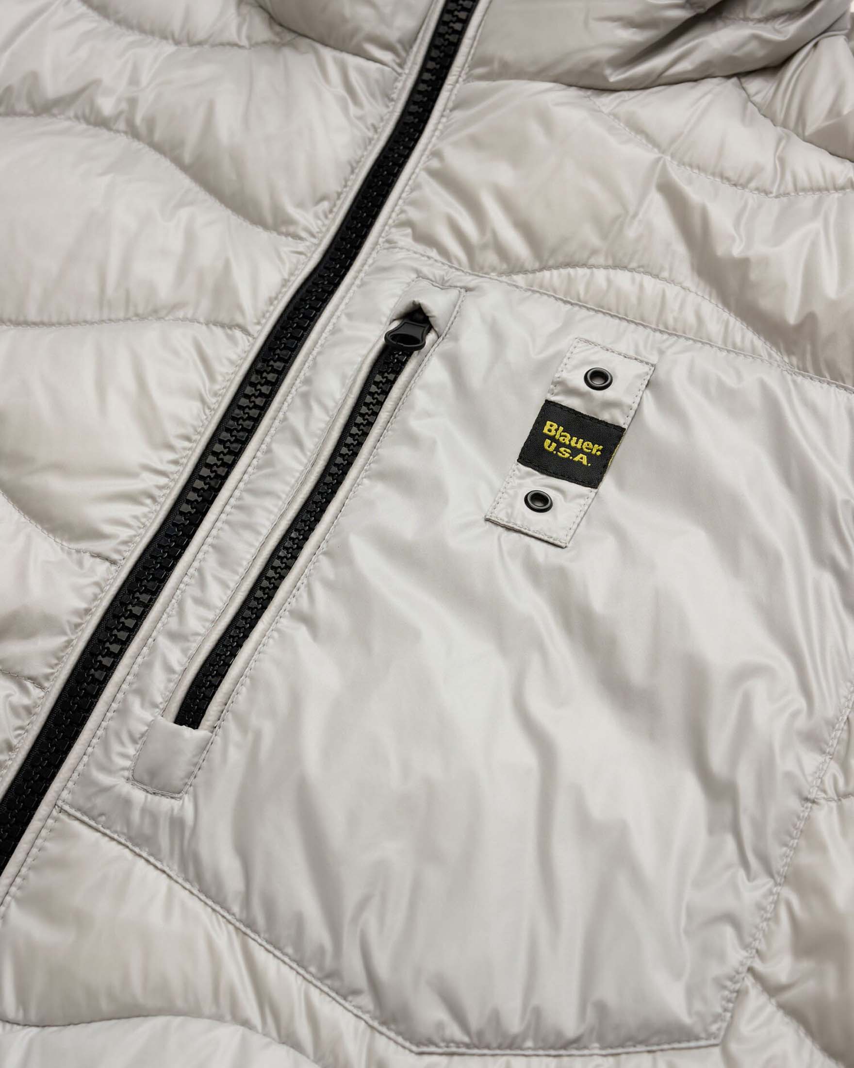 Piumino Wave grigio chiaro 100 grammi con cappuccio e trapuntatura