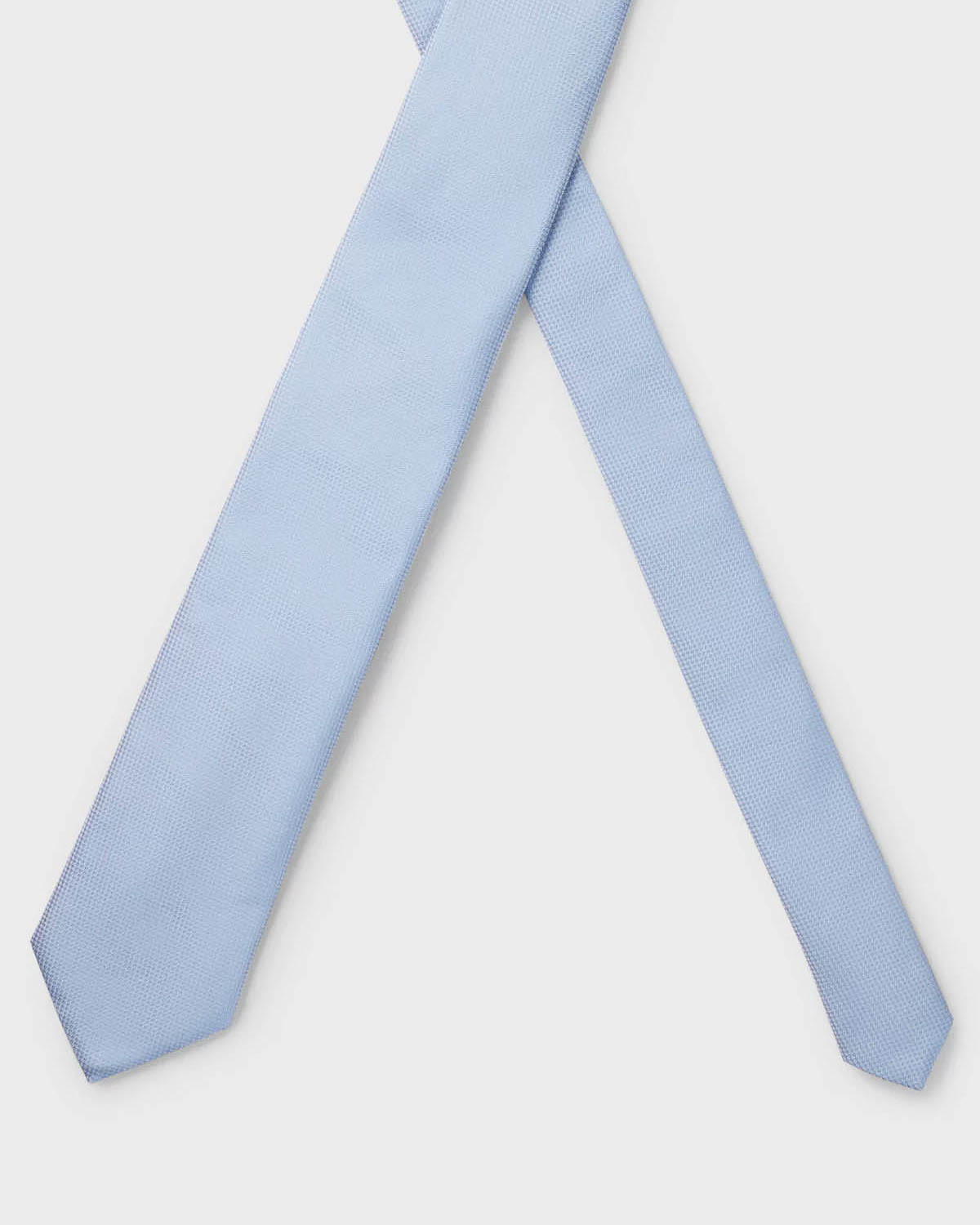 Cravatta azzurra in misto seta mirco armatura image