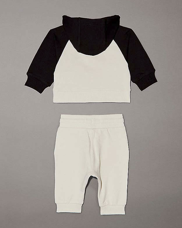 Tuta bicolore panna e nera in cotone stretch image