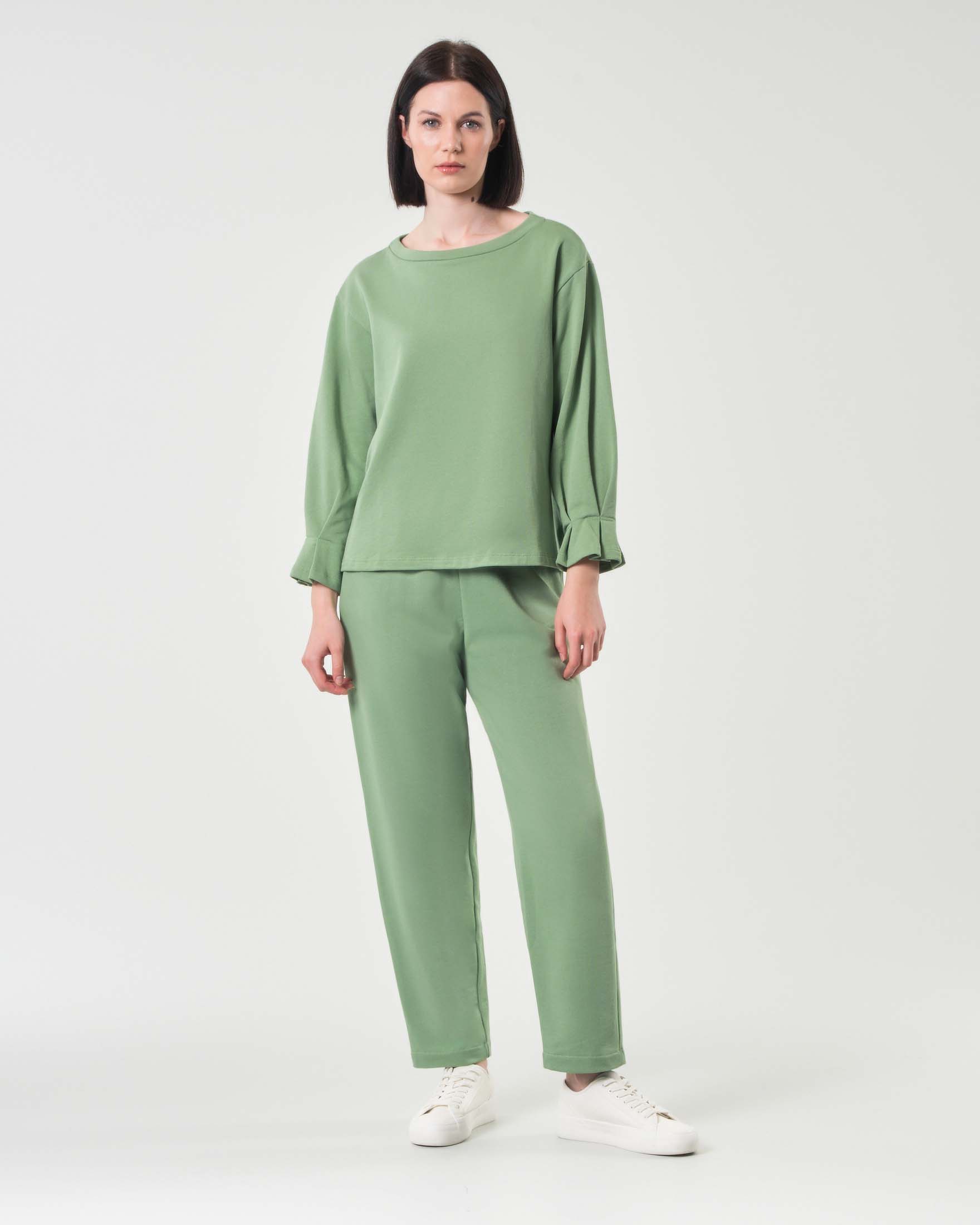 Pantaloni verde chiaro in felpa di cotone garzato dalla linea dritta con elastico in vita