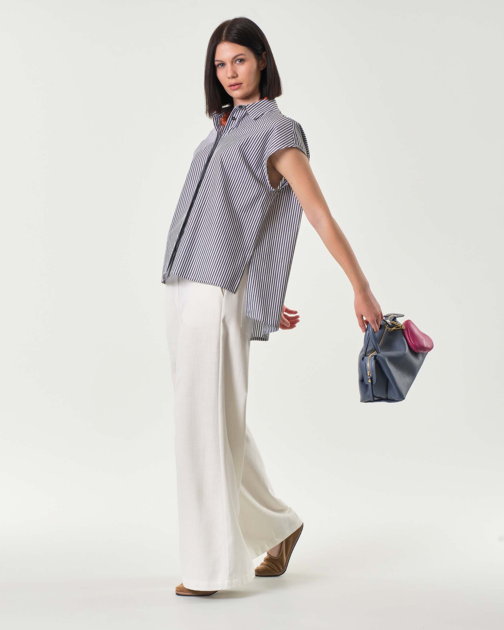 Pantaloni palazzo bianchi in denim di cotone con elastico inserito in vita sul retro