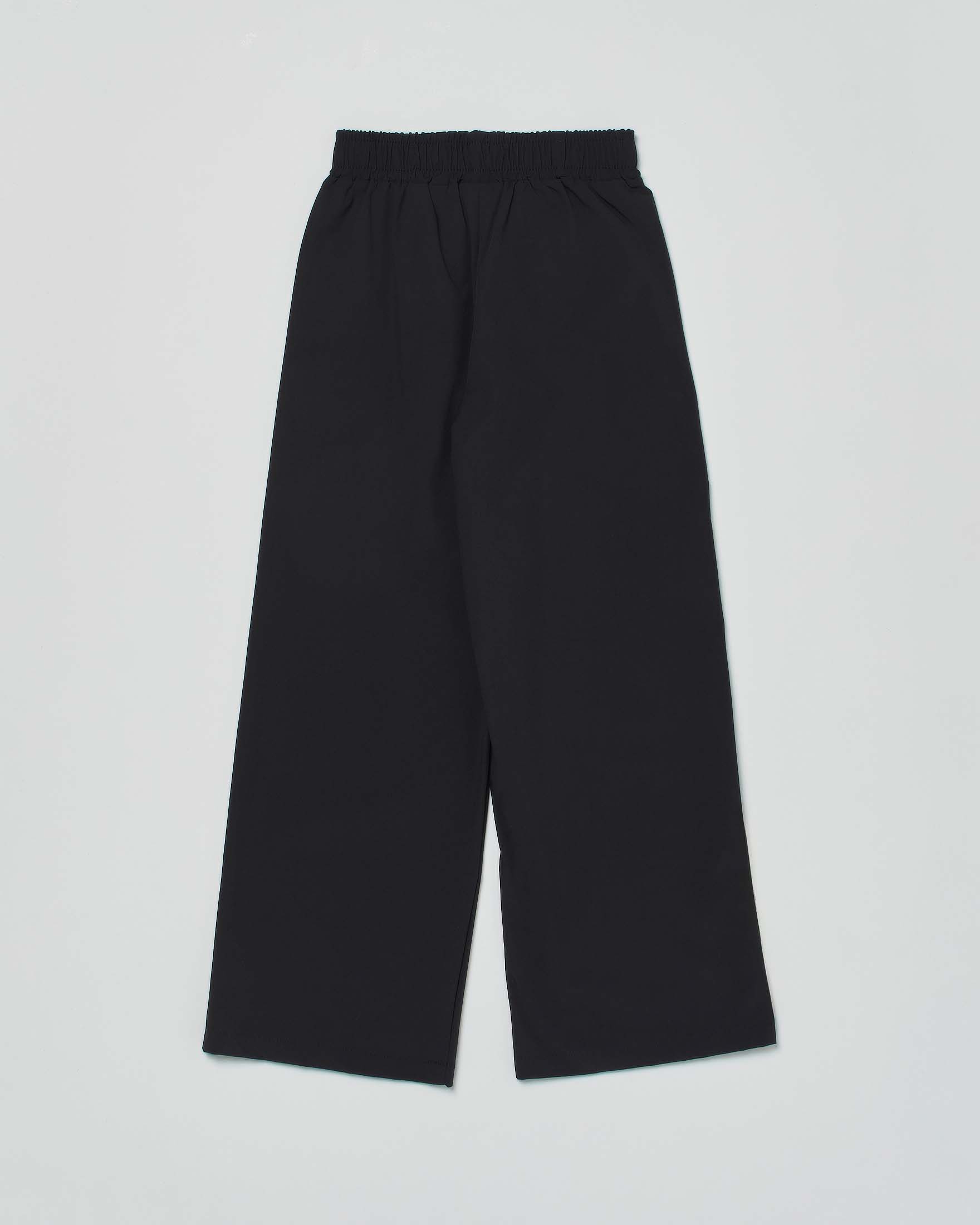 Pantalone palazzo Disclaimer nero in tessuto tecnico elasticizzato