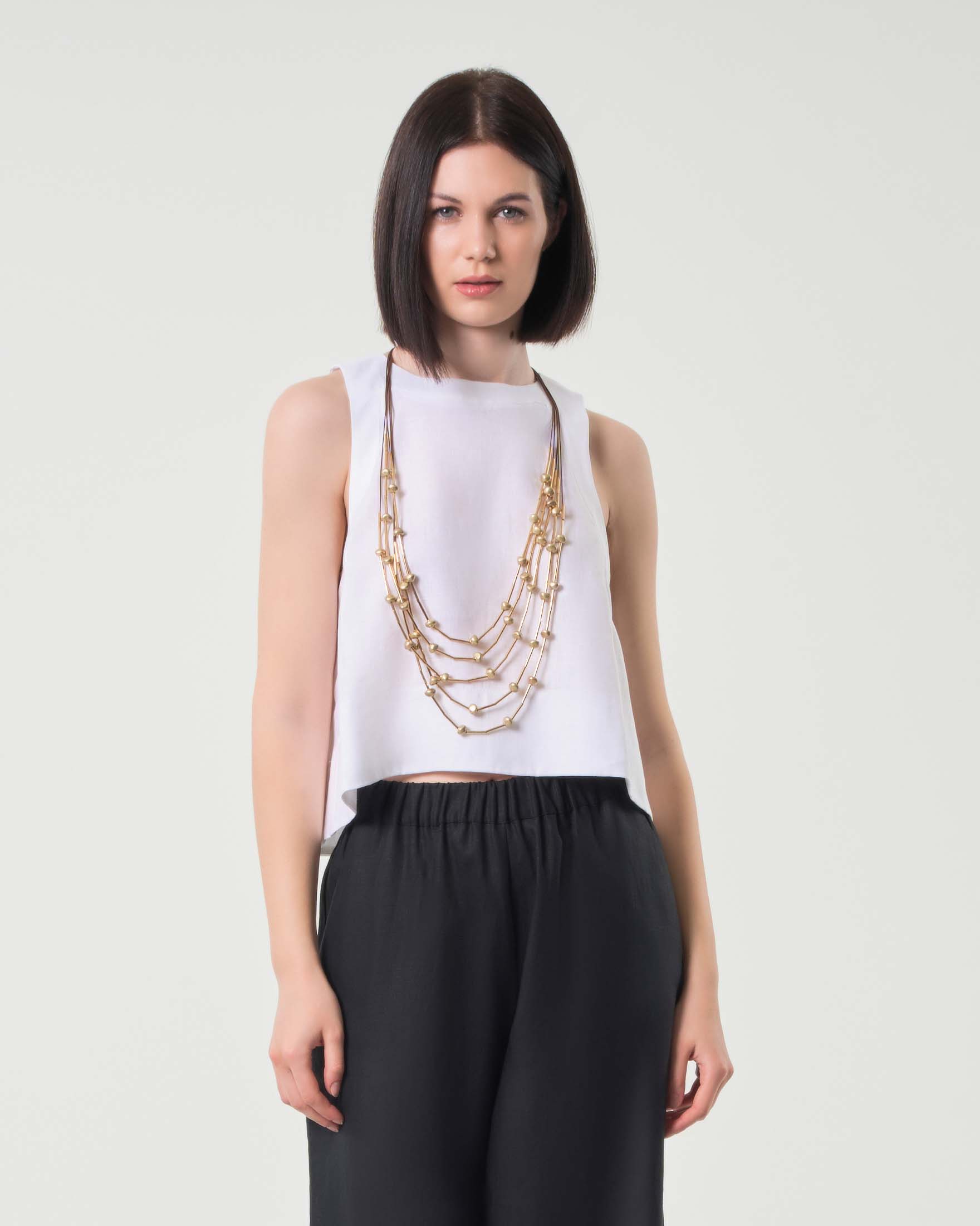 Crop top bianco senza maniche in cotone con scollo all'americana