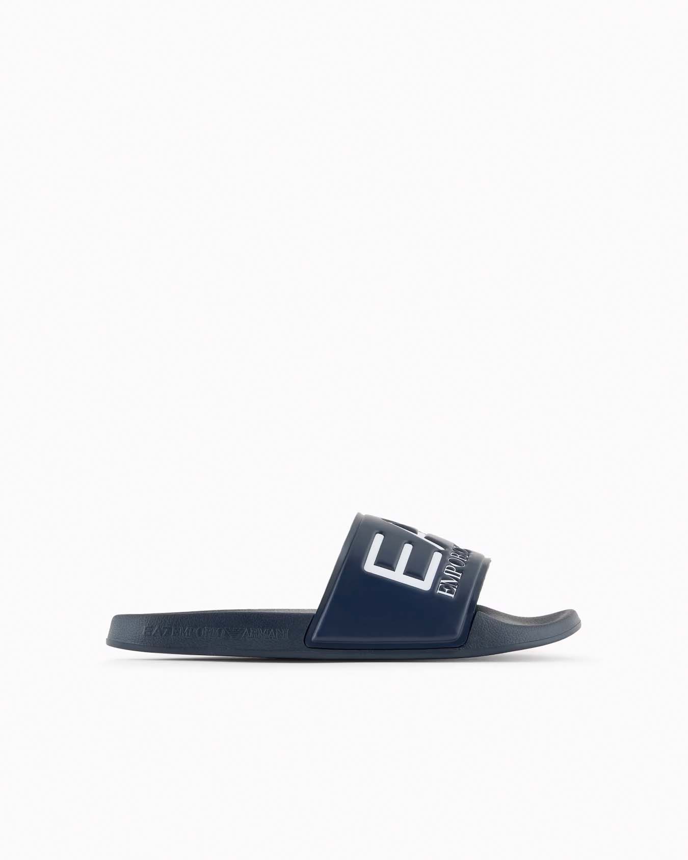 Ciabatta slider blu con maxi scritta bianca sulla fascia