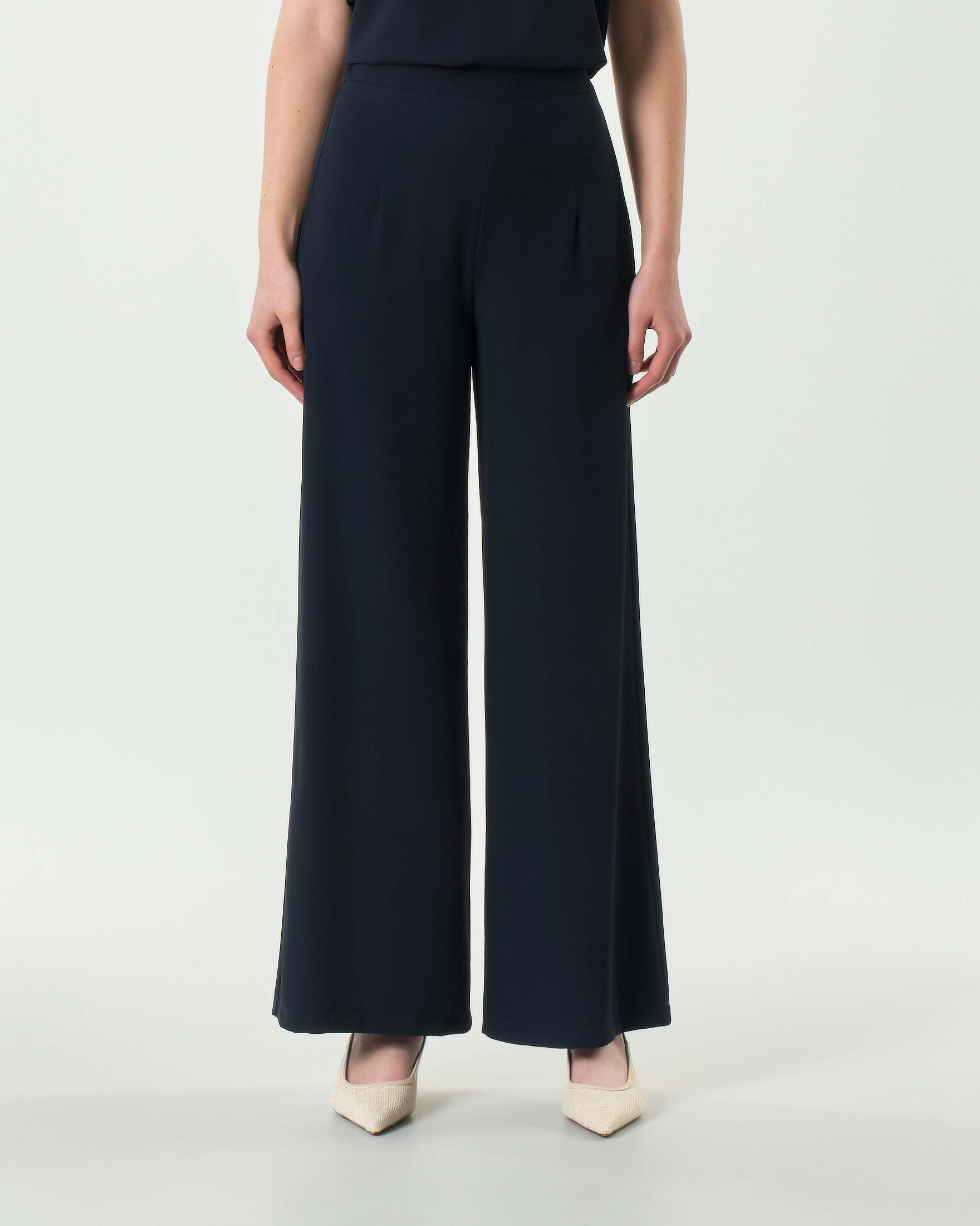 Pantaloni palazzo blu in tessuto stretch fluido a vita media