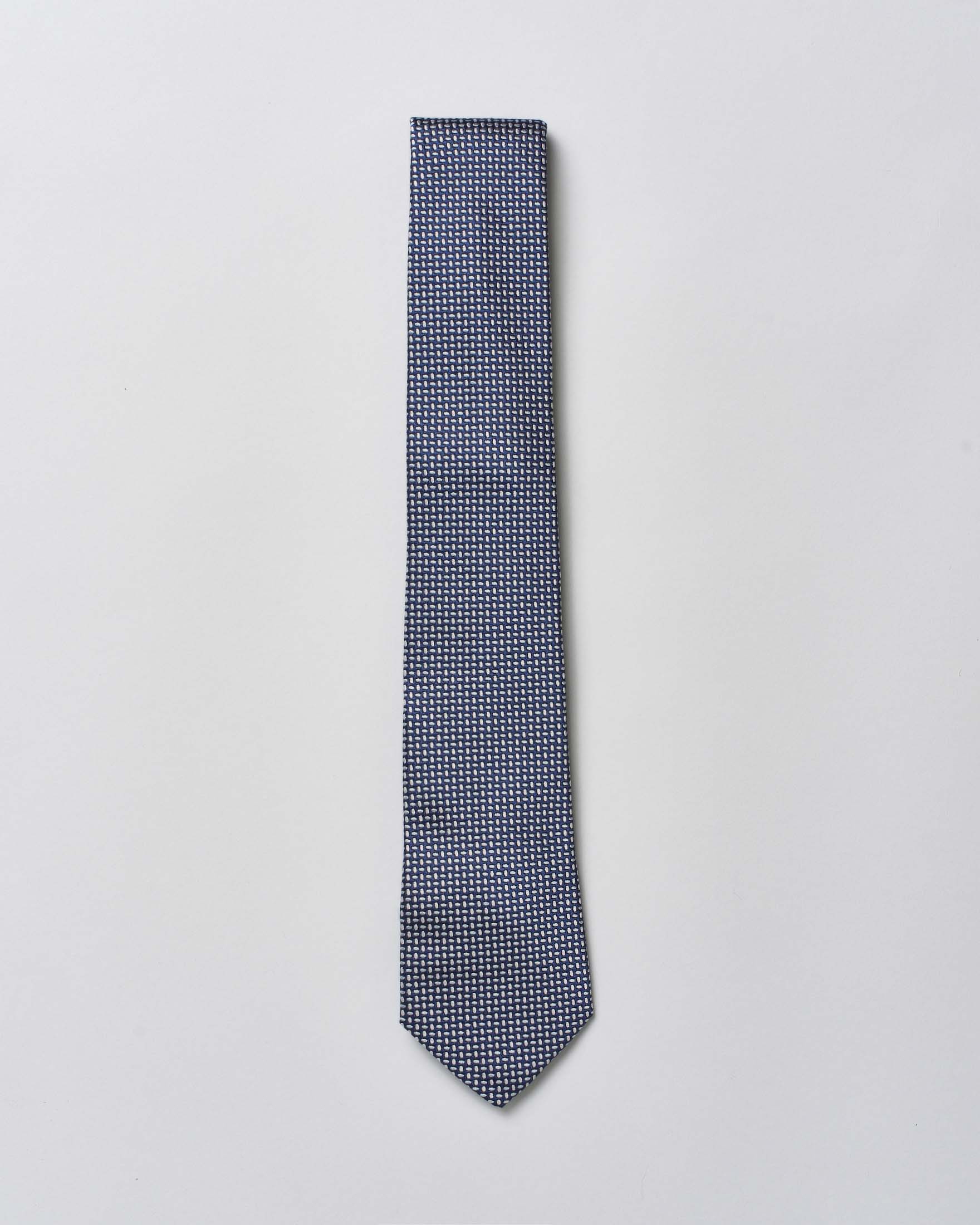 Cravatta Pellizzari blu in fantasia micro ovali bianchi di pura seta