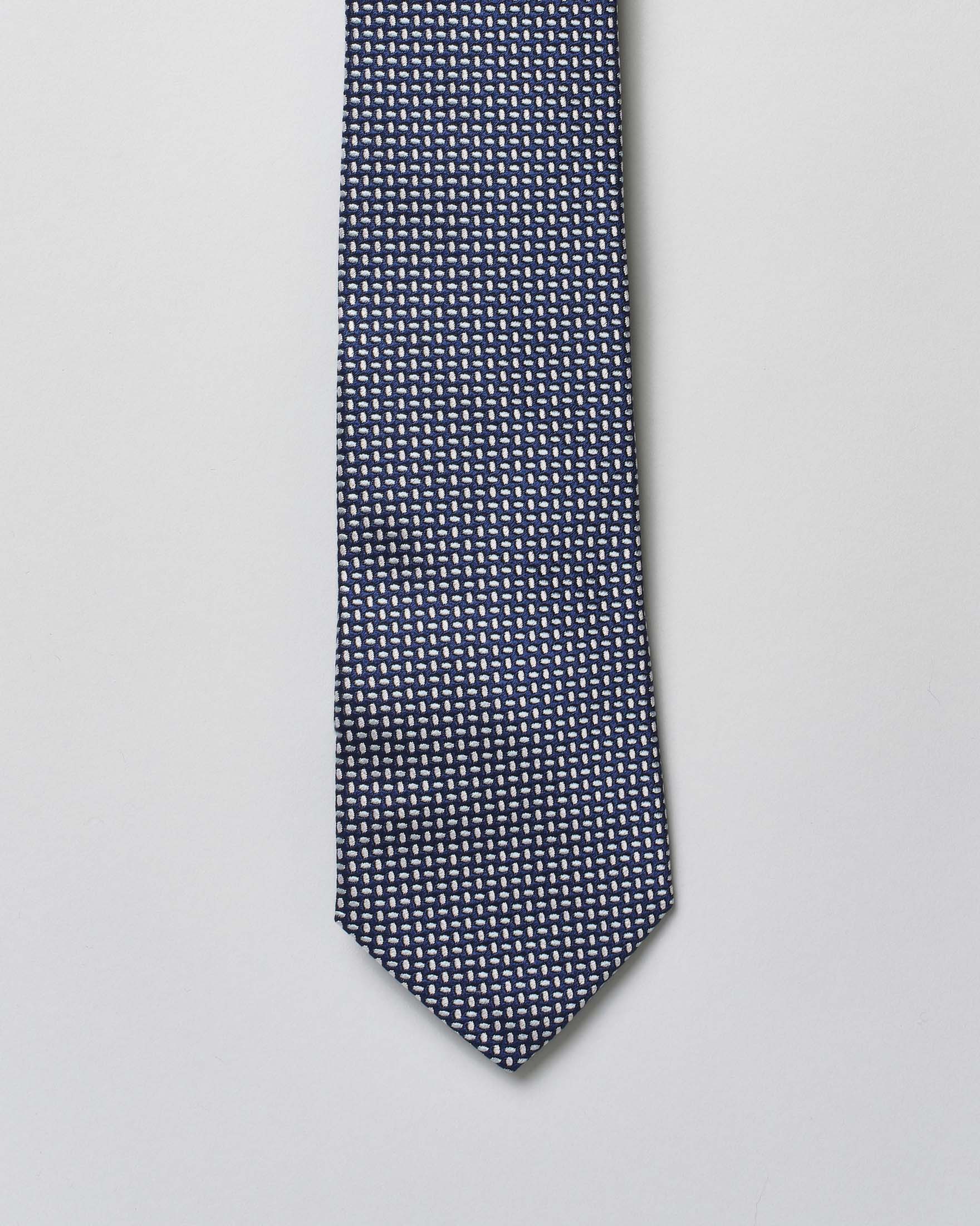 Cravatta Pellizzari blu in fantasia micro ovali bianchi di pura seta image