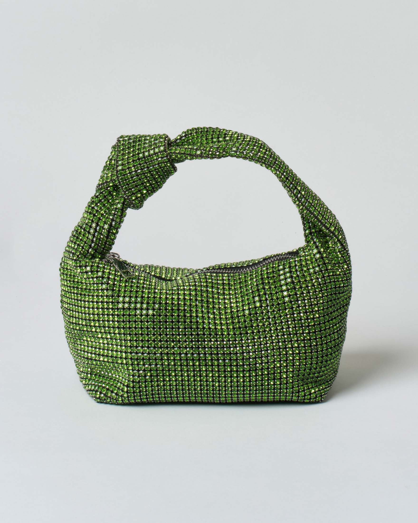 Borsa in maglia di strass verde con nodo sul manico