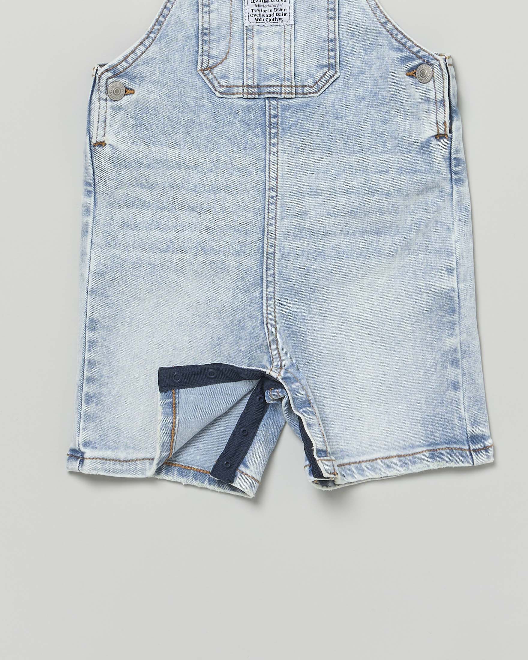 Salopette Levi's in denim di cotone a lavaggio chiaro bleach washed