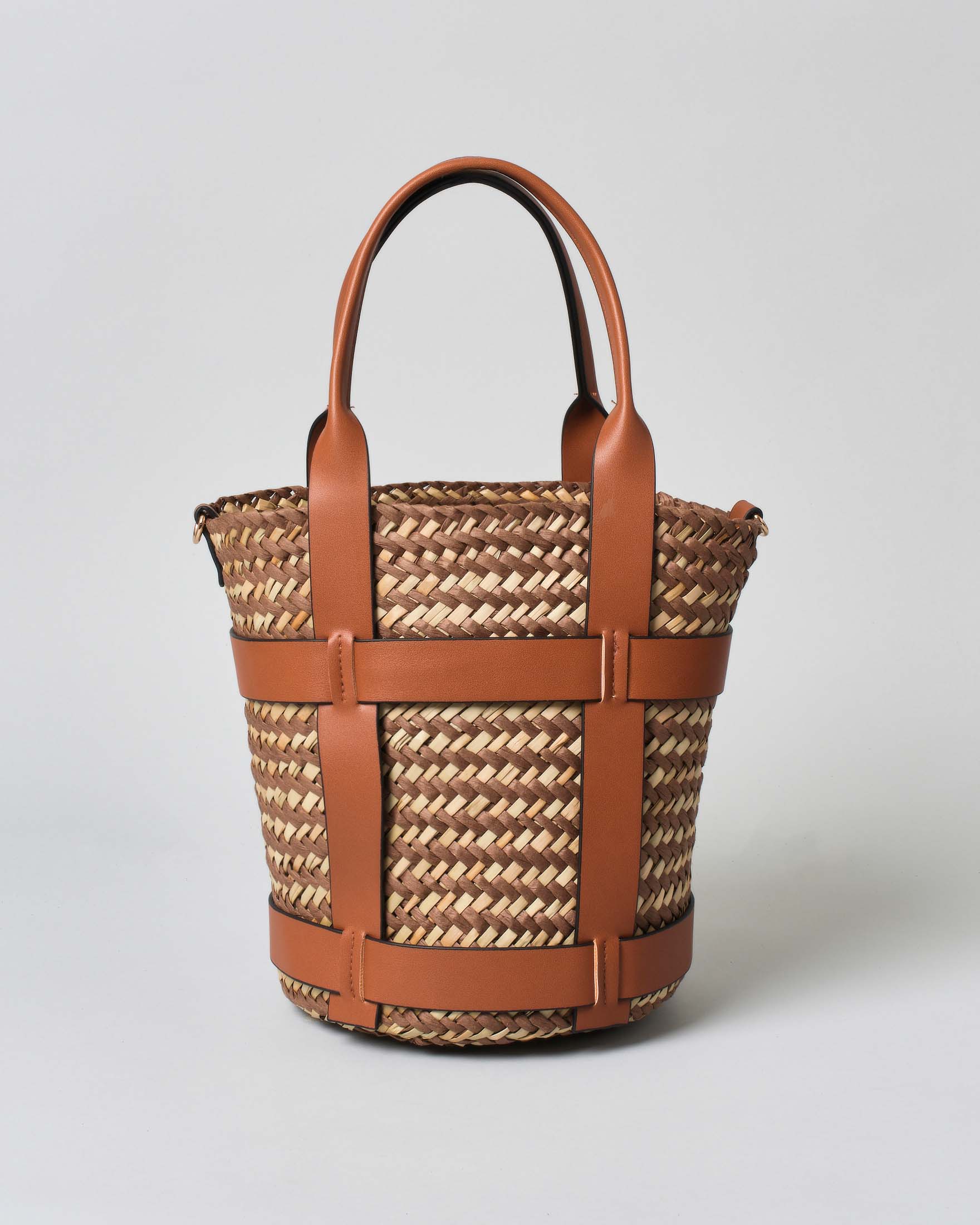 Secchiello in raffia intrecciata inserto in pelle liscia color cuoio