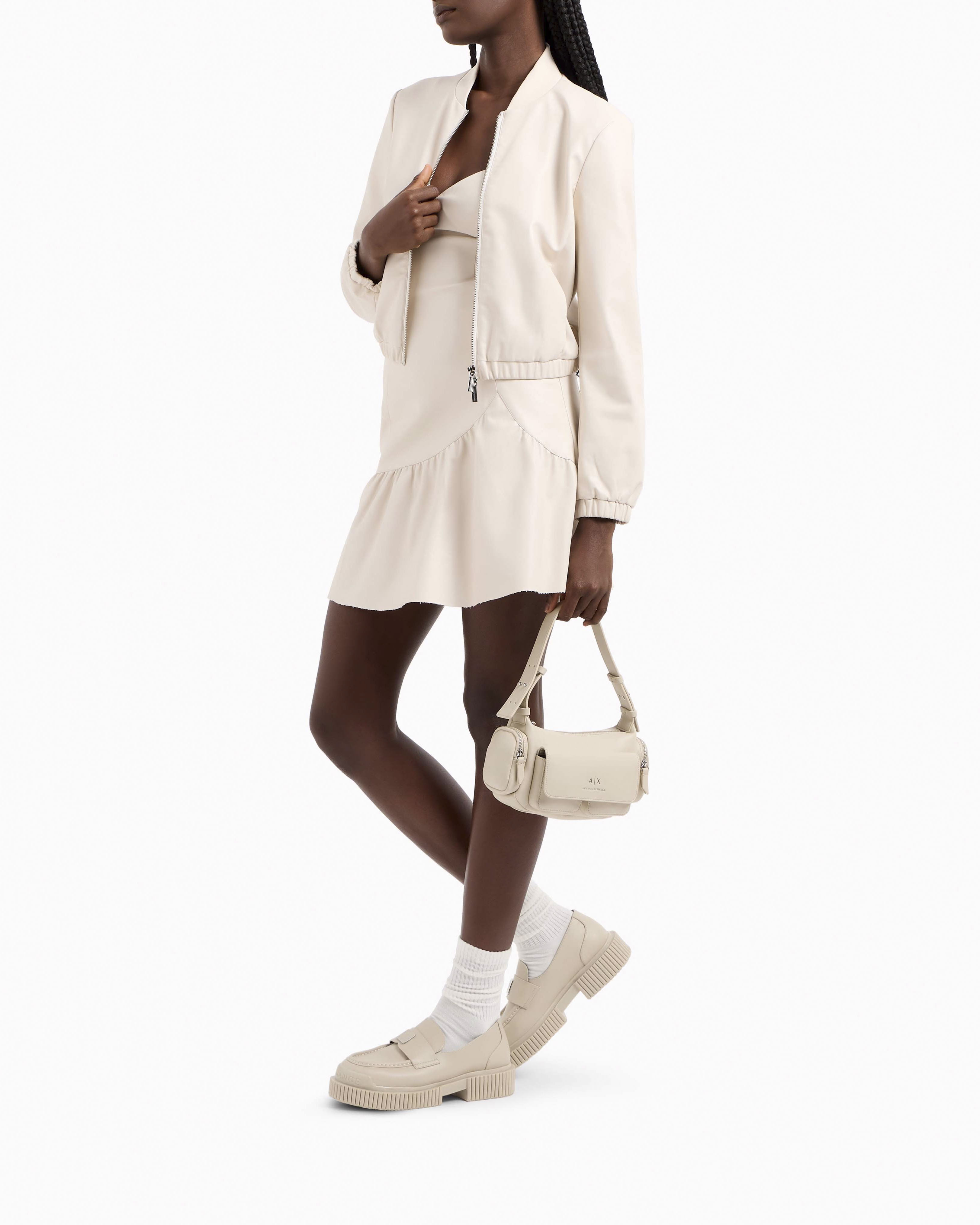 Bomber corto beige Armani Exchange in similpelle con elastico inserito al fondo image