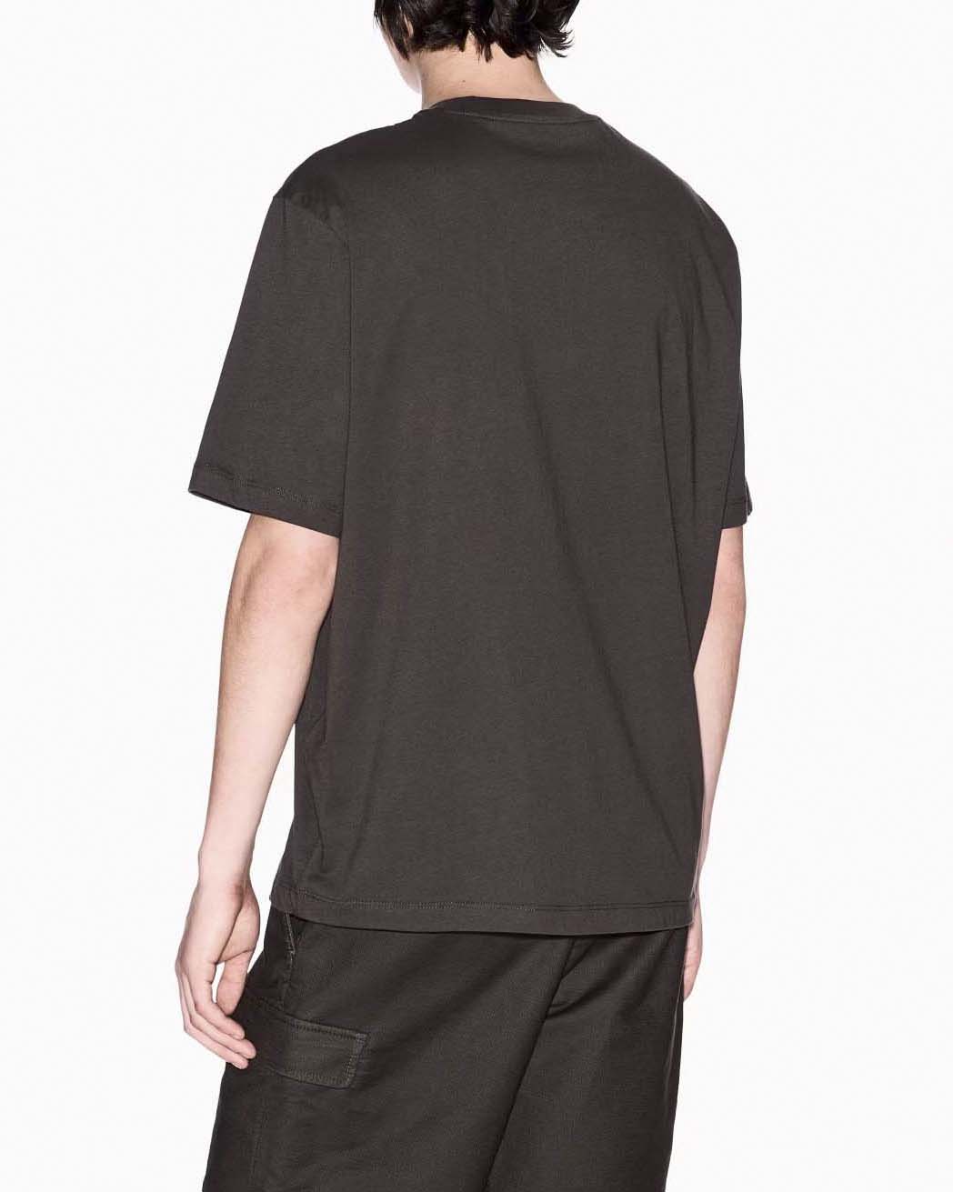 T-shirt mezza manica Armani Exchange verde militare con stampa palme e logo davanti image