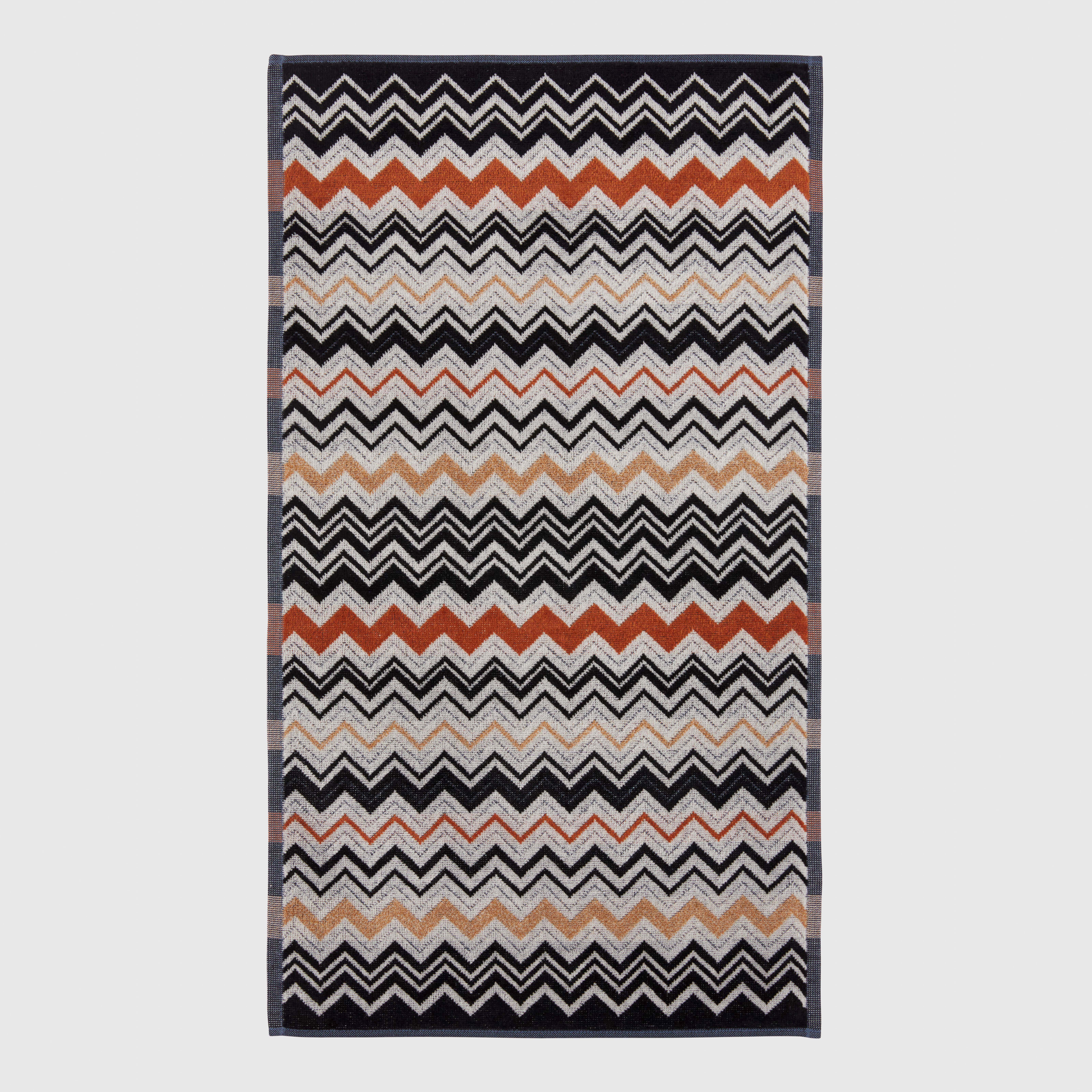 Asciugamano ospite Bernard in spugna di cotone a fantasia chevron bianco nero e coccio image