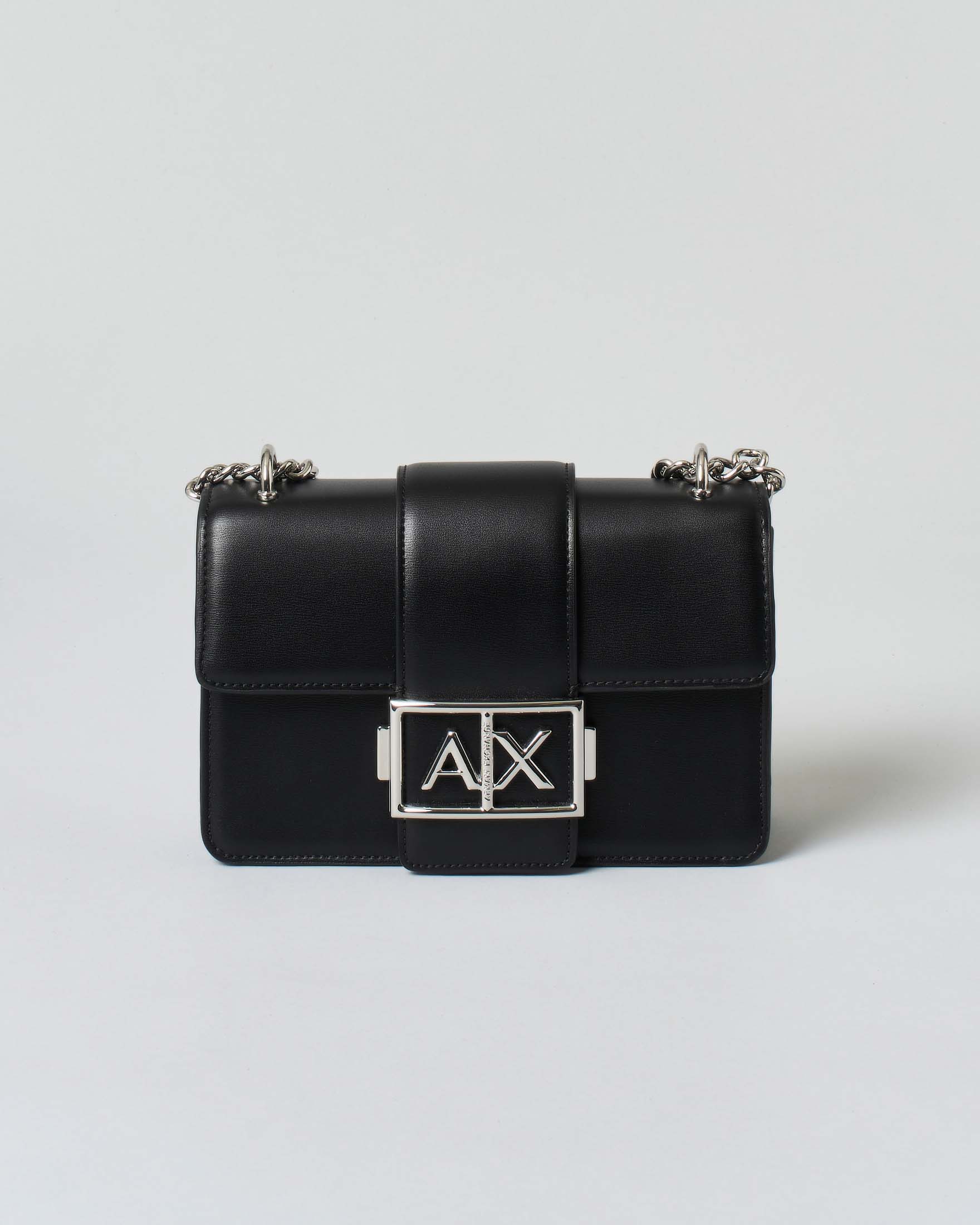Borsa nera Exchange in similpelle liscia con patta di chiusura e fibbia logo in metallo