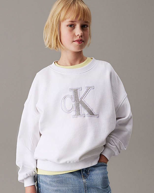 Felpa oversize Calvin Klein bianca in puro cotone con logo monogramma argento