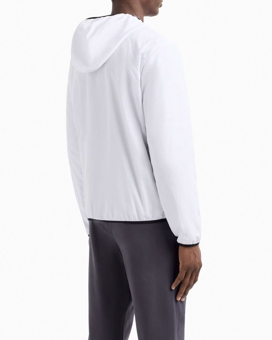 Giubbino EA7 bianco in tessuto tecnico con cappuccio e logo stampato sul petto image