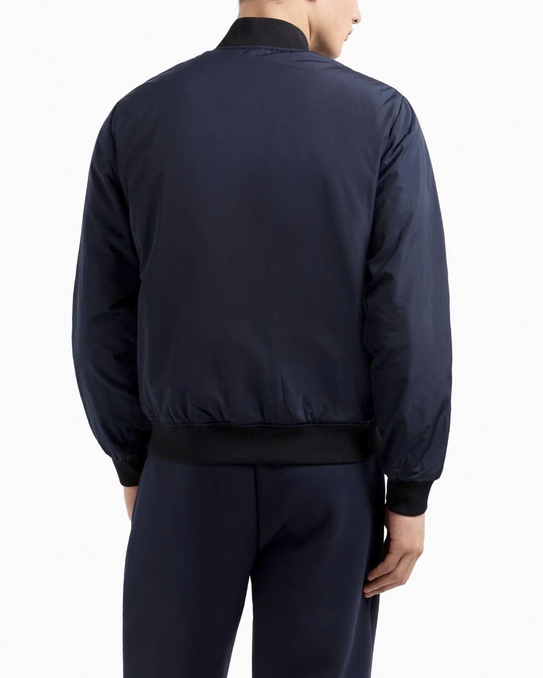 Giubbino EA7 blu in nylon con colletto bowling e logo scudetto sul petto image