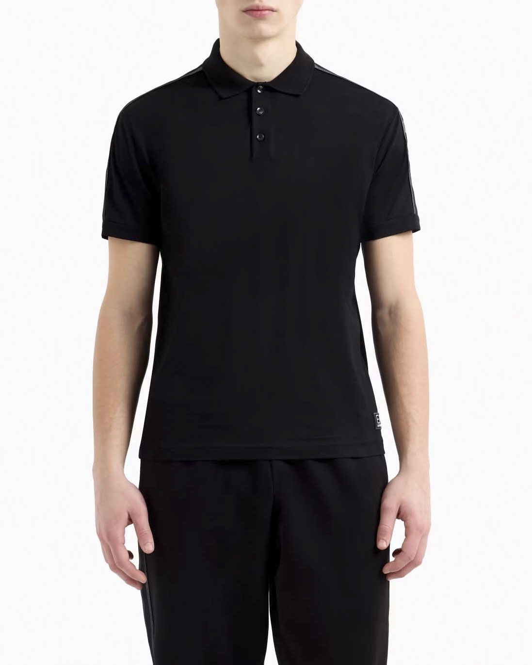 Polo EA7 nera in jersey di cotone con tape porta logo sulle spalle