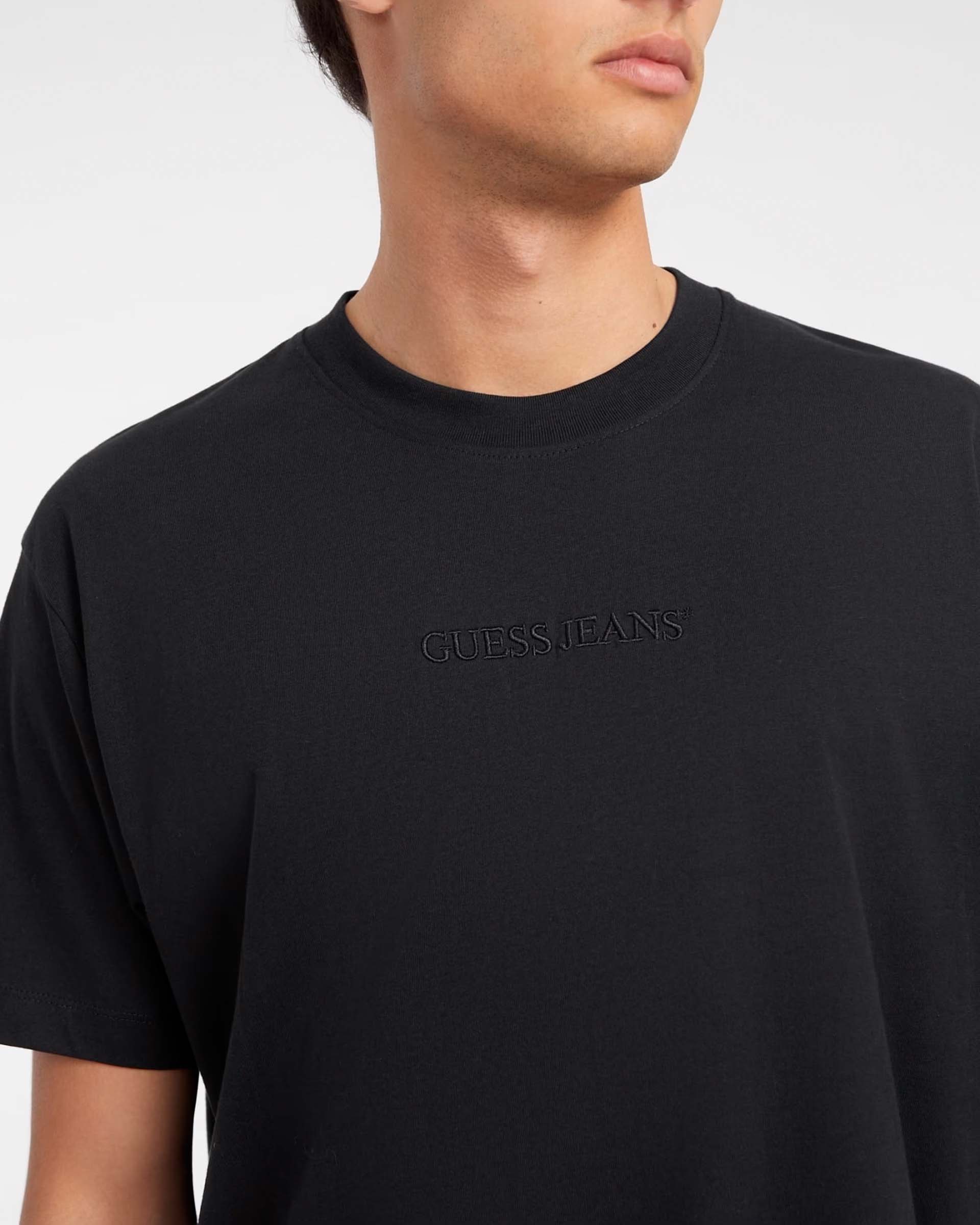 T-shirt Guess Jeans nera relaxed-fit con logo ricamato in tono