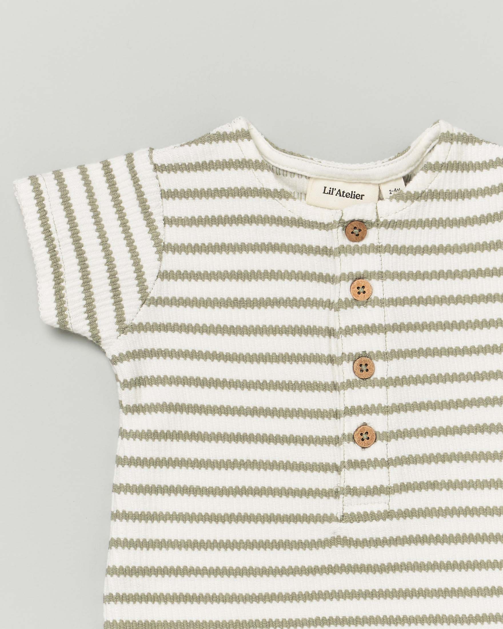 Pagliaccetto Lil'Atelier in maglia di cotone a righe color panna e verde militare image