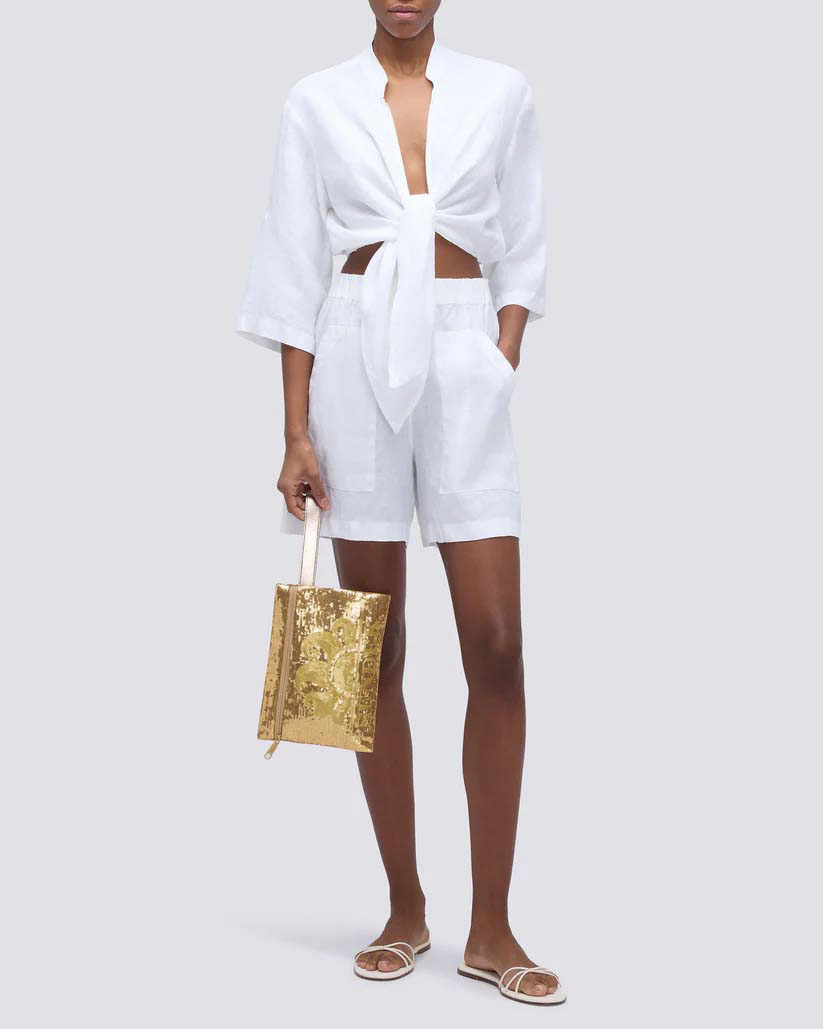 Pochette in paillettes oro Sundek con logo a contrasto e laccetto per il polso in similpelle image