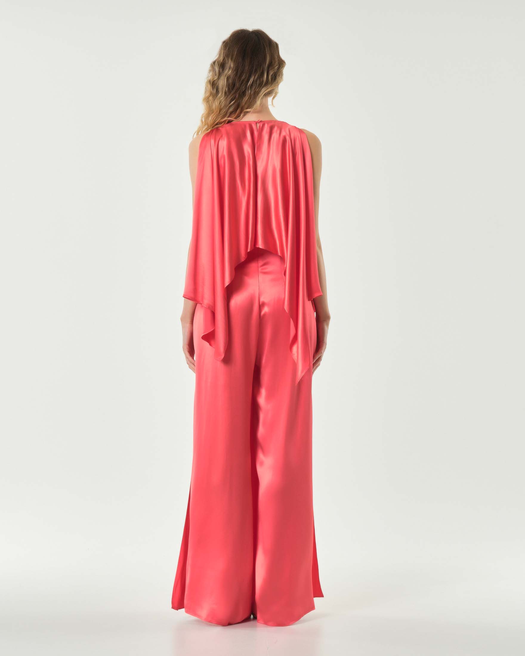 Tuta color corallo Pinko in satin di viscosa con pannelli asimmetrici
