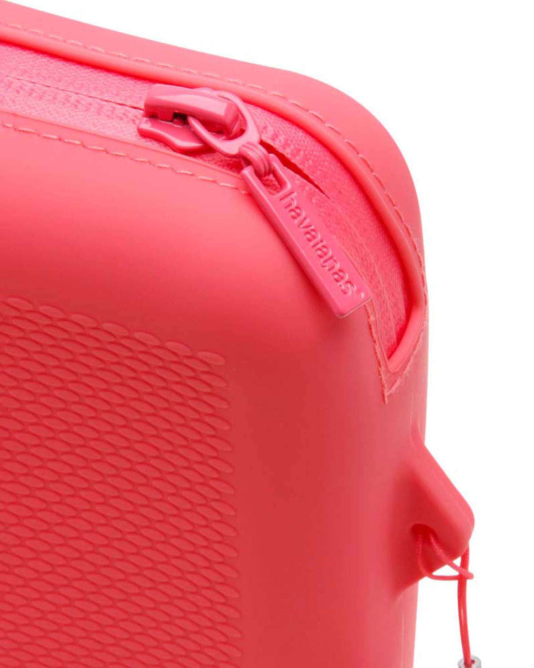 Havaianas Necessaire color corallo misura media con a lavorazione a grana di riso e logo in rilievo image