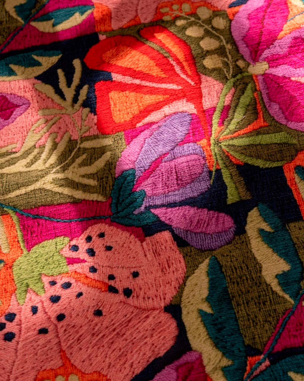 Tappeto Kiriku a fantasia floreale multicolore con bordatura verde 52x80