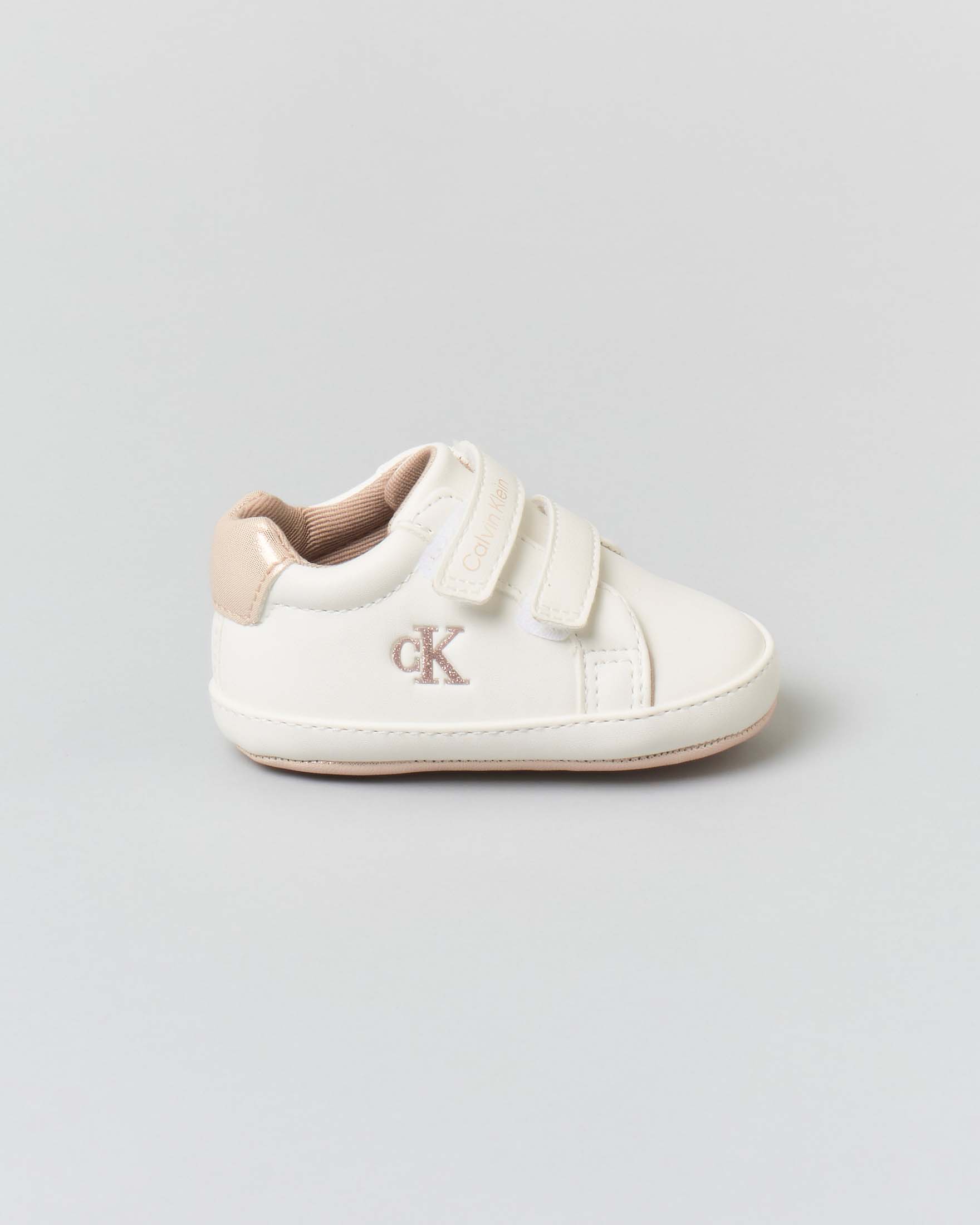 Sneakers bianche in ecopelle con chiusura a velcro e dettagli rosa