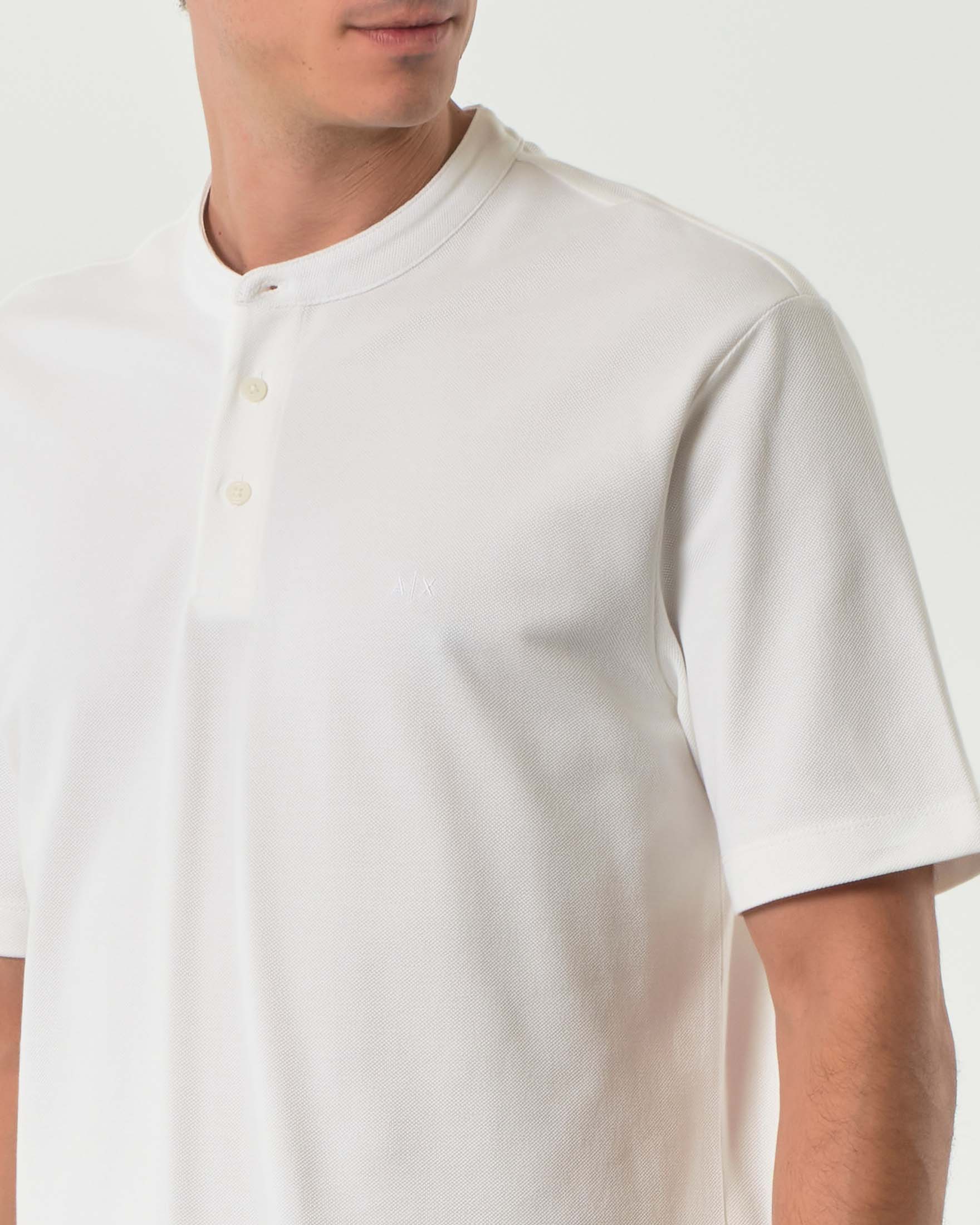 Polo Armani Exchange bianca con colletto a coreana in piquet di cotone image