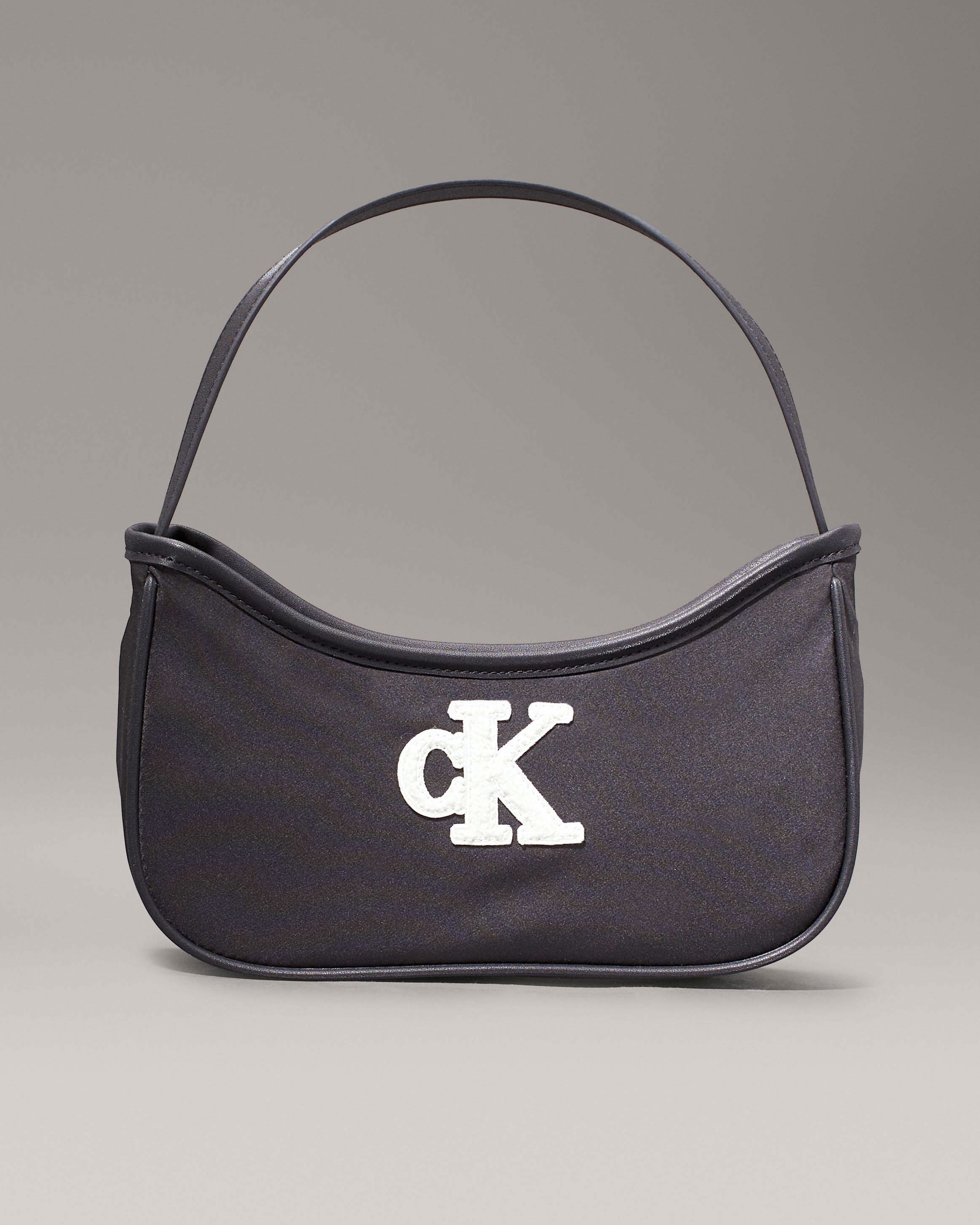 Mini borsa Calvin Klein nera a spalla in nylon con logo bianco