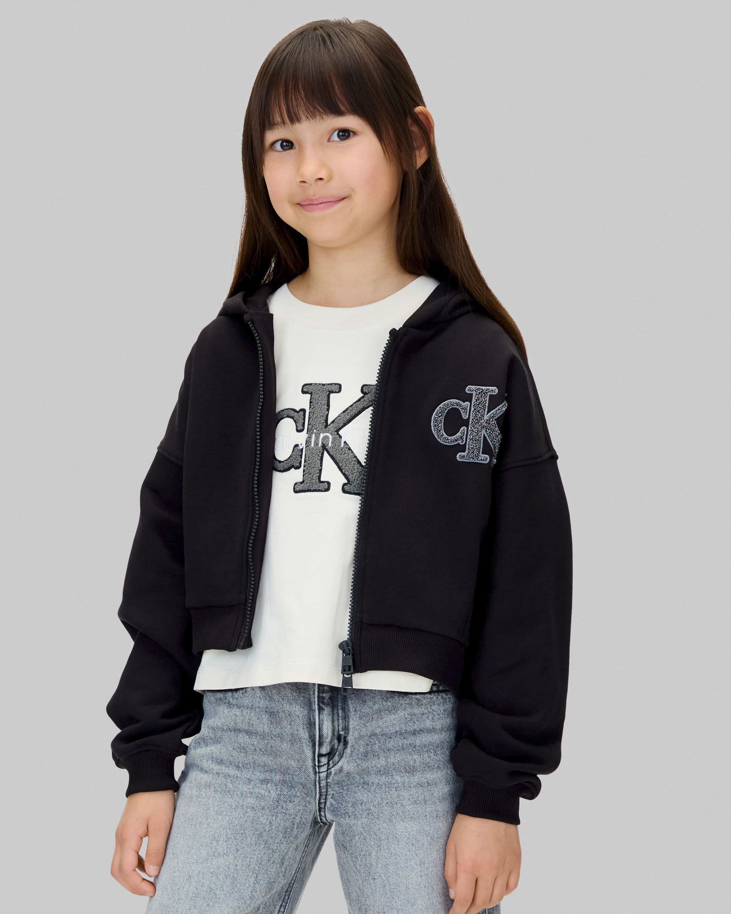 Felpa cropped Calvin Klein nera con cappuccio e zip