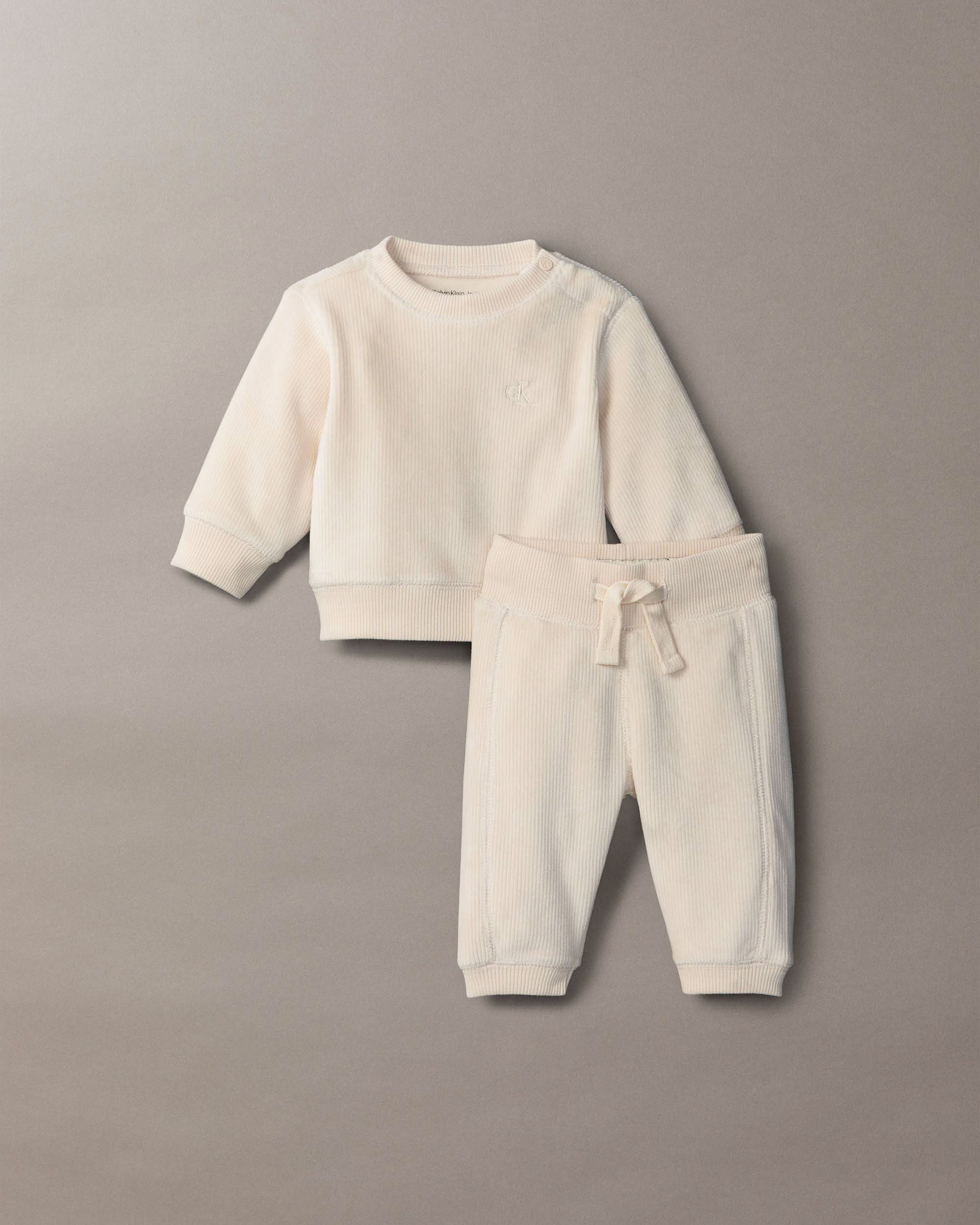 Completo Calvin Klein maglia e pantalone color panna a costine in ciniglia