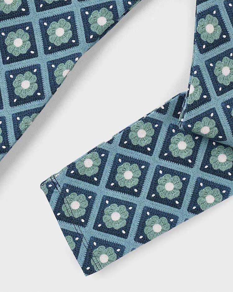 Leggins Mayoral in fantasia geometrica con fiorellini verde acqua e blu image