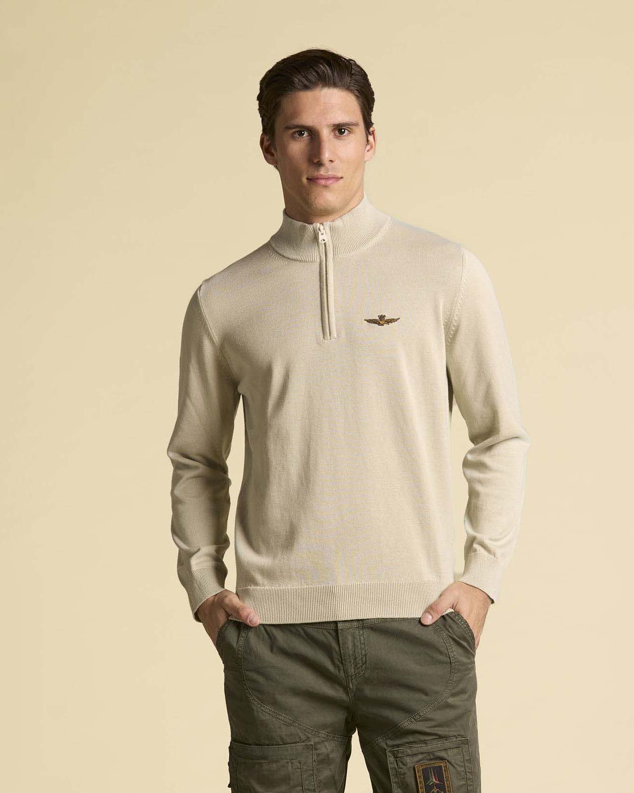 Maglia beige in puro cotone con chiusura a mezza zip