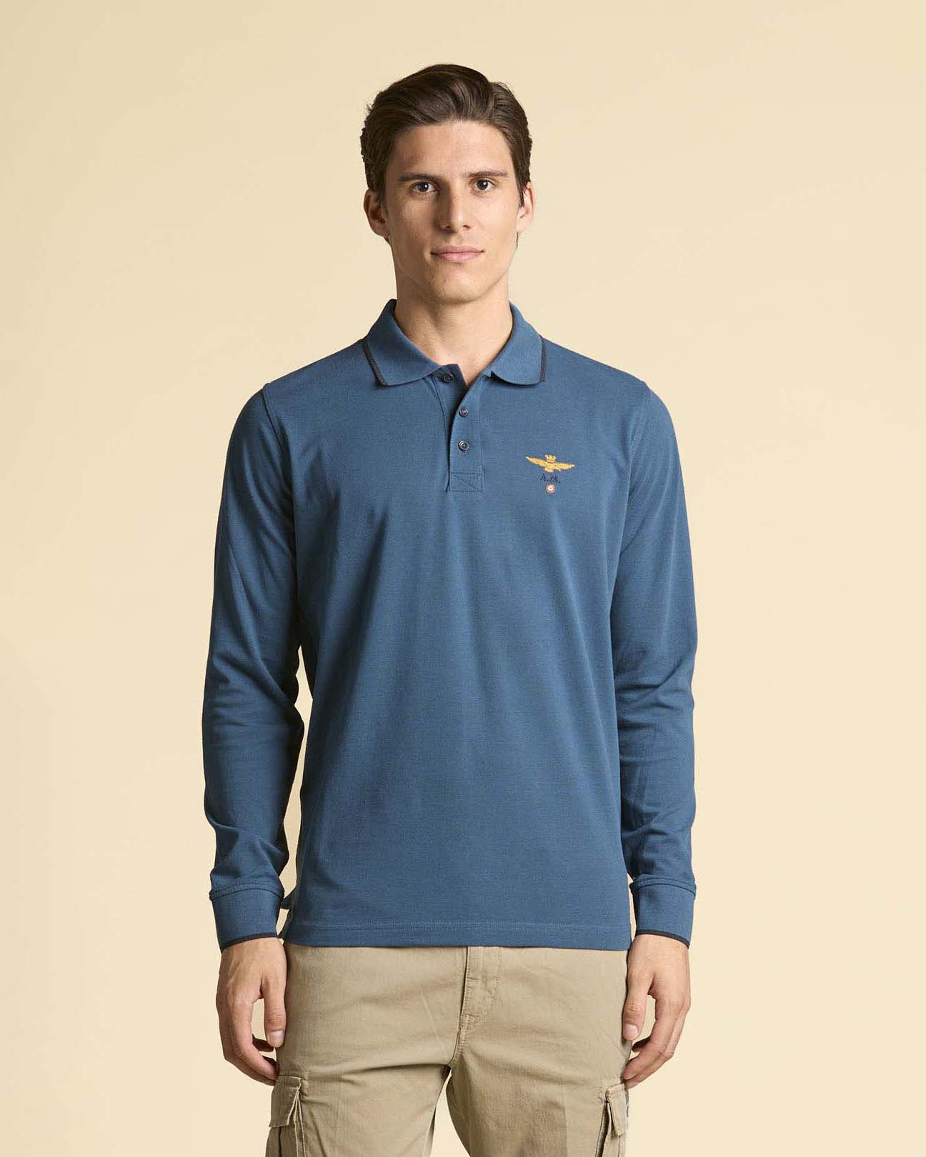 Polo manica lunga ottanio in micro piquè di puro cotone con bordino blu