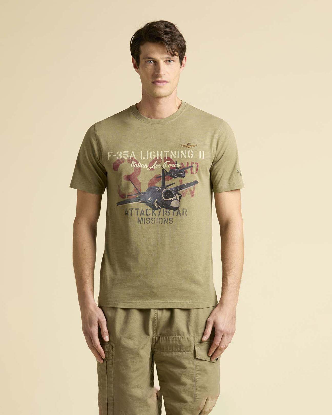 T-shirt verde salvia mezza manica con stampa aereo