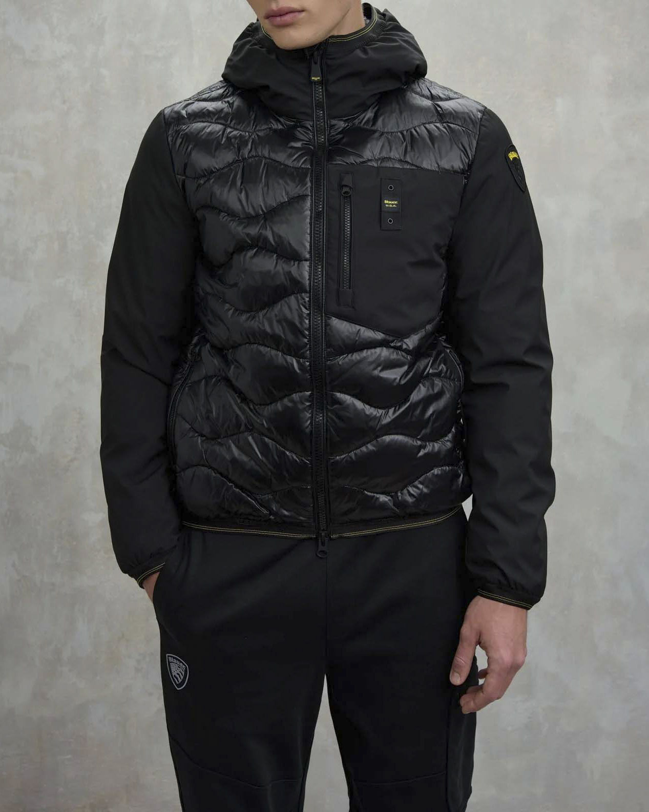 Piumino Albert Blauer bi-tessuto nero con cappuccio fisso e trapuntatura ad onde