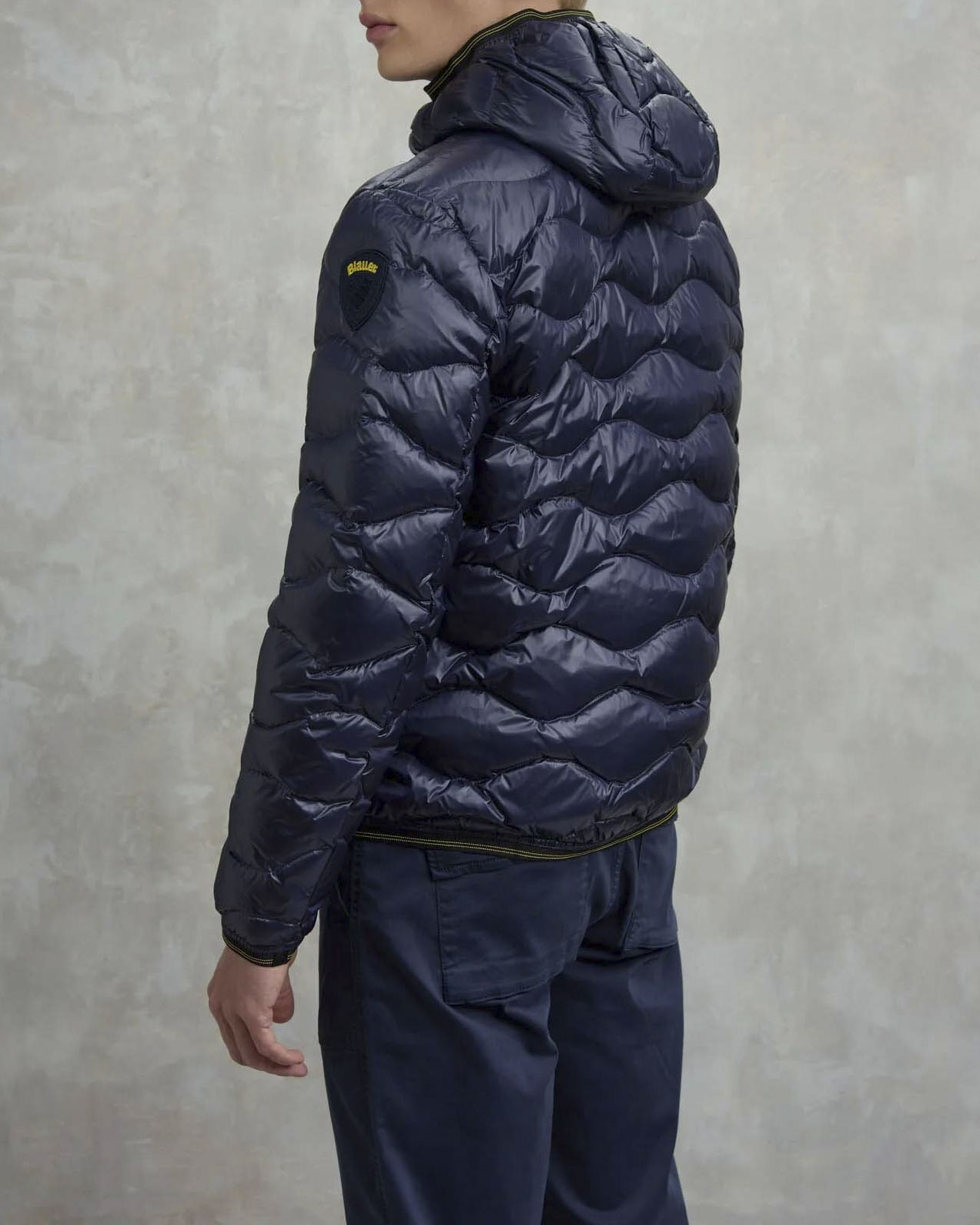 Piumino Wave Blauer blu con cappuccio fisso e trapuntatura ad onde