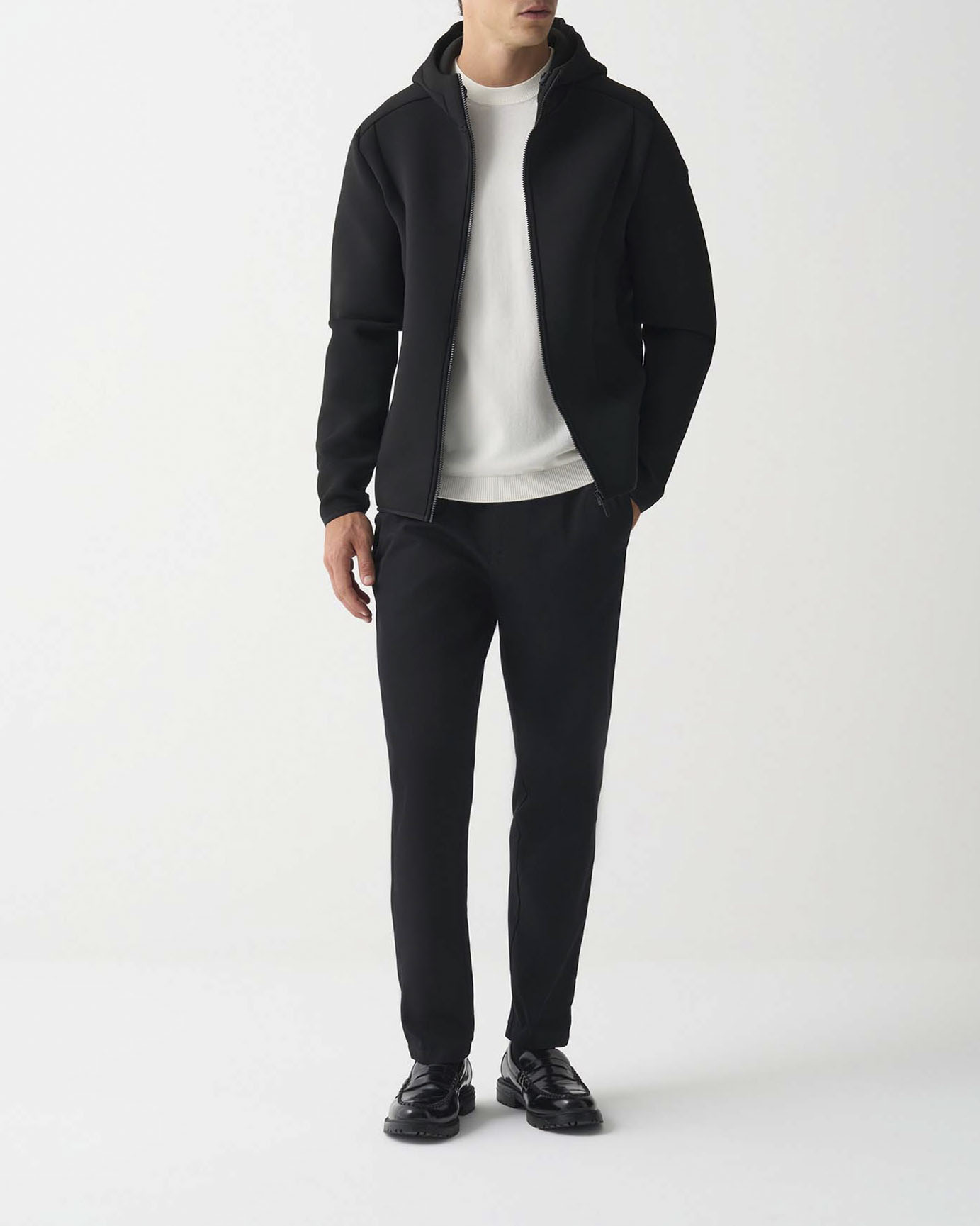 Giubbino Colmar Originals nero in tessuto stretch simil neoprene con cappuccio