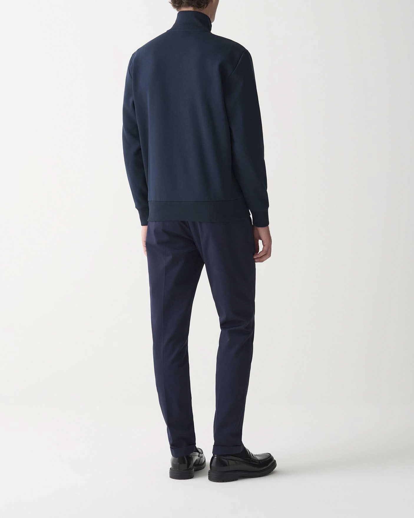 Felpa Colmar Originals blu con chiusura zip e logo bollo applicato sulla manica