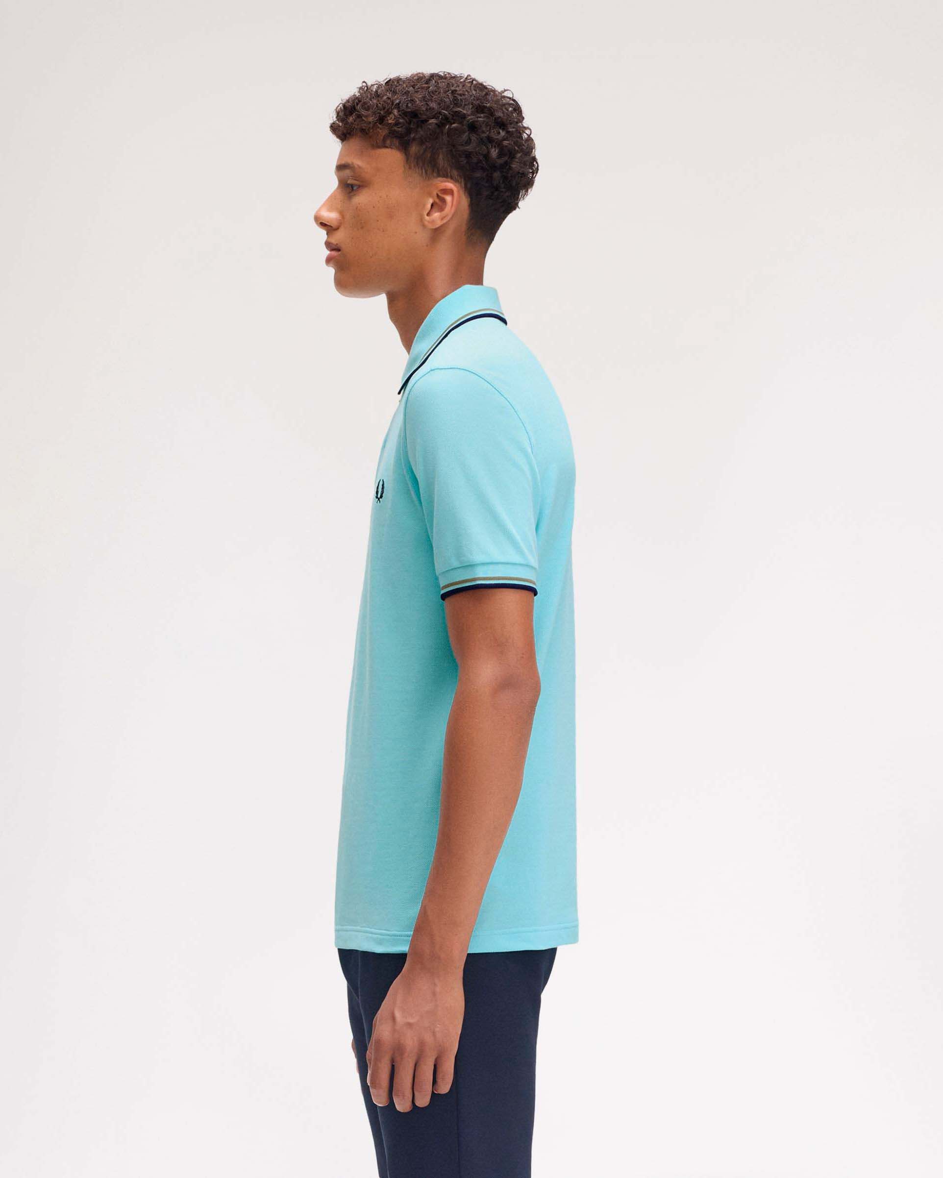 Polo Fred Perry color acqua mezza manica con bordino blu e militare
