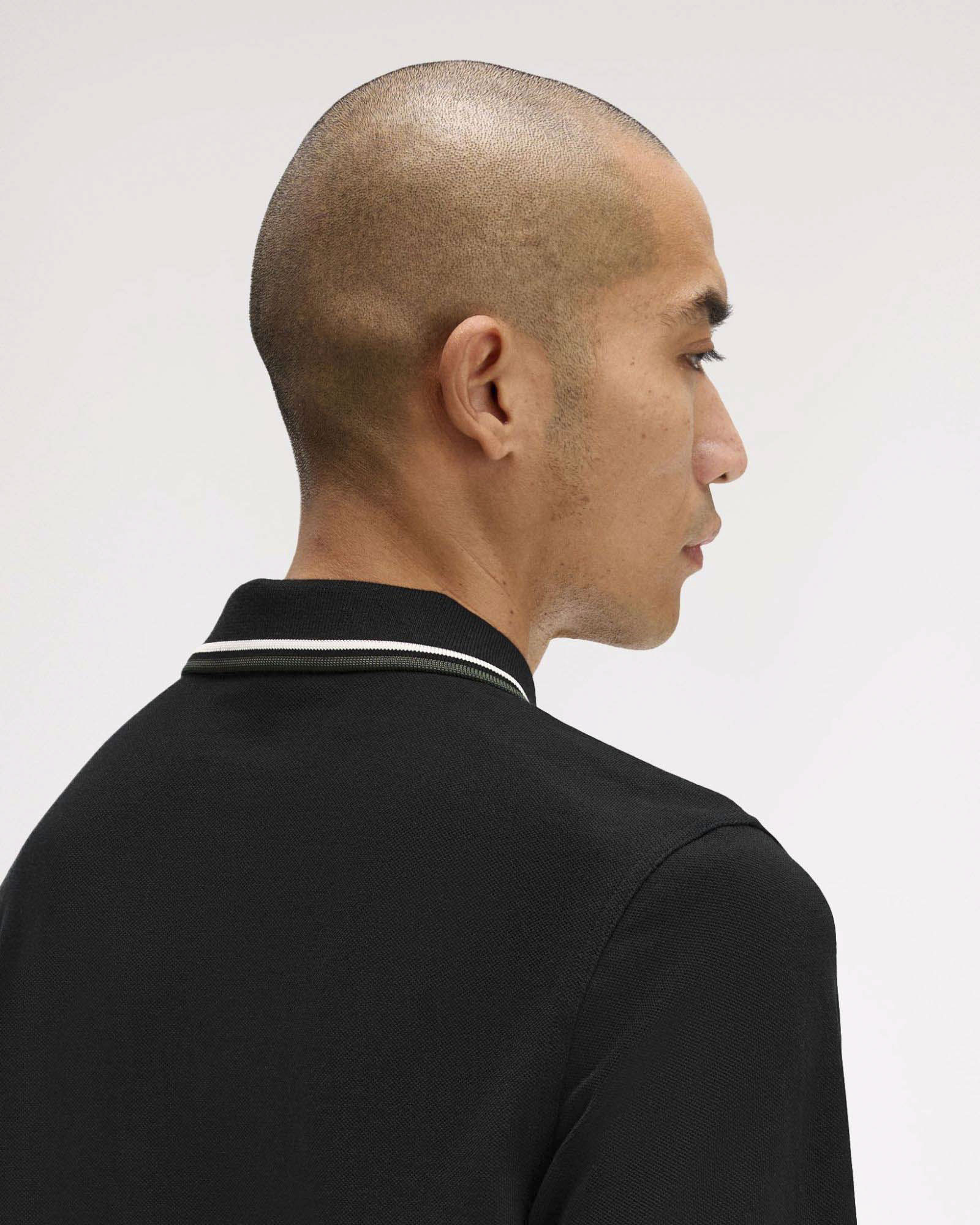 Polo manica lunga Fred Perry nera con bordino bianco e militare